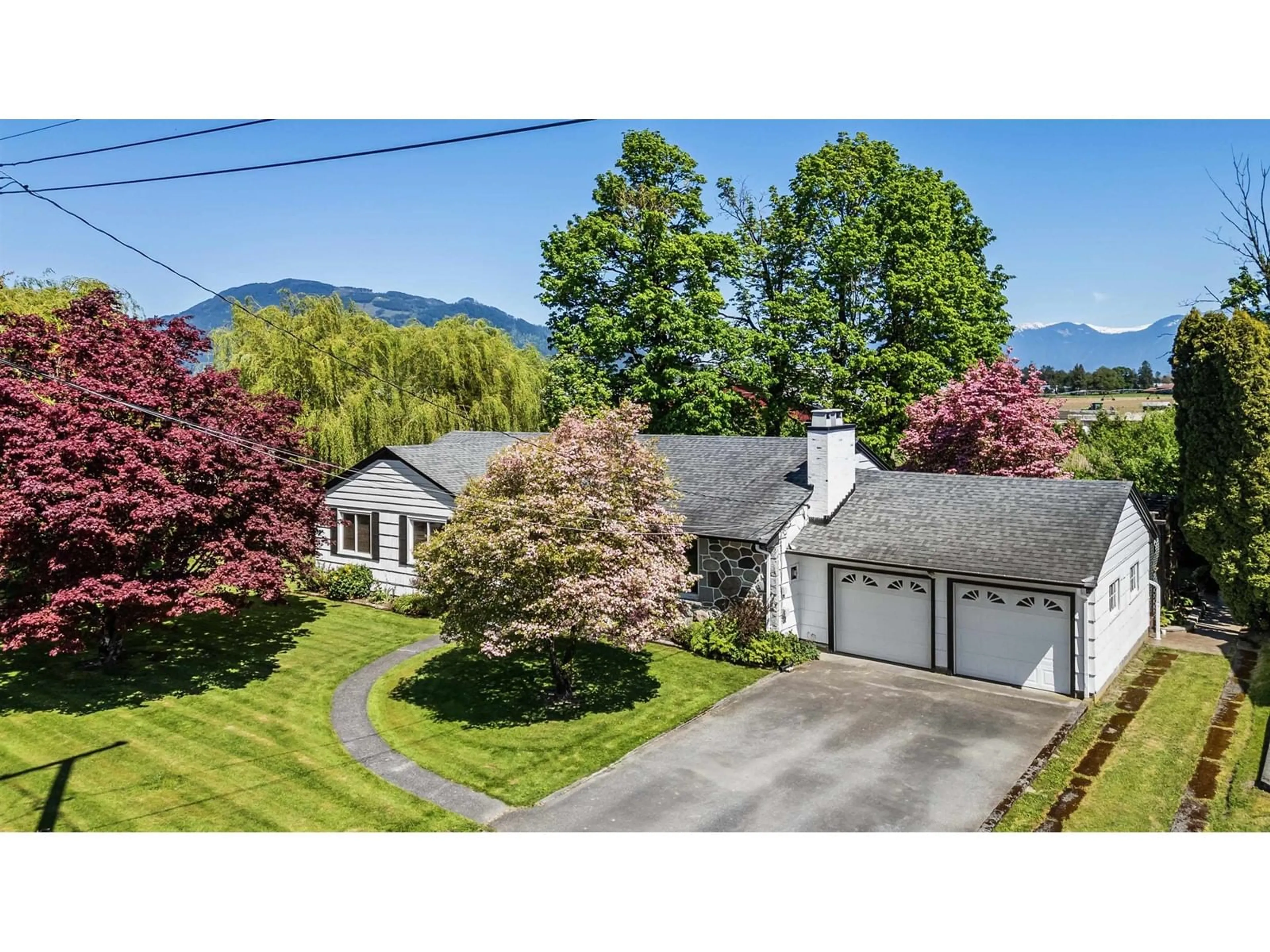 A pic from outside/outdoor area/front of a property/back of a property/a pic from drone, mountain view for 10760 MCDONALD ROAD, Chilliwack British Columbia V2P7L6