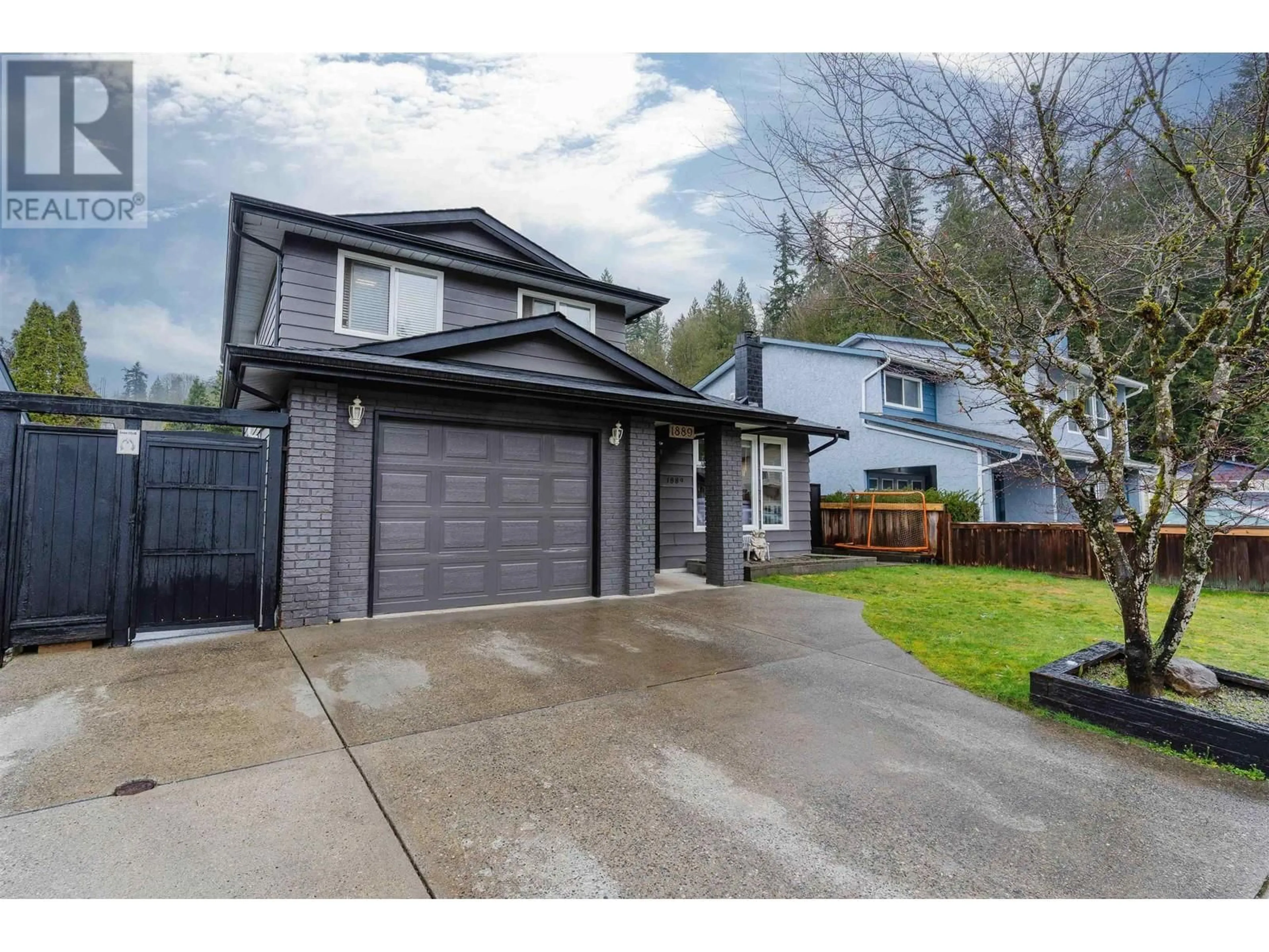 Home with vinyl exterior material, street for 1889 BLUFF WAY, Coquitlam British Columbia V3E1J3