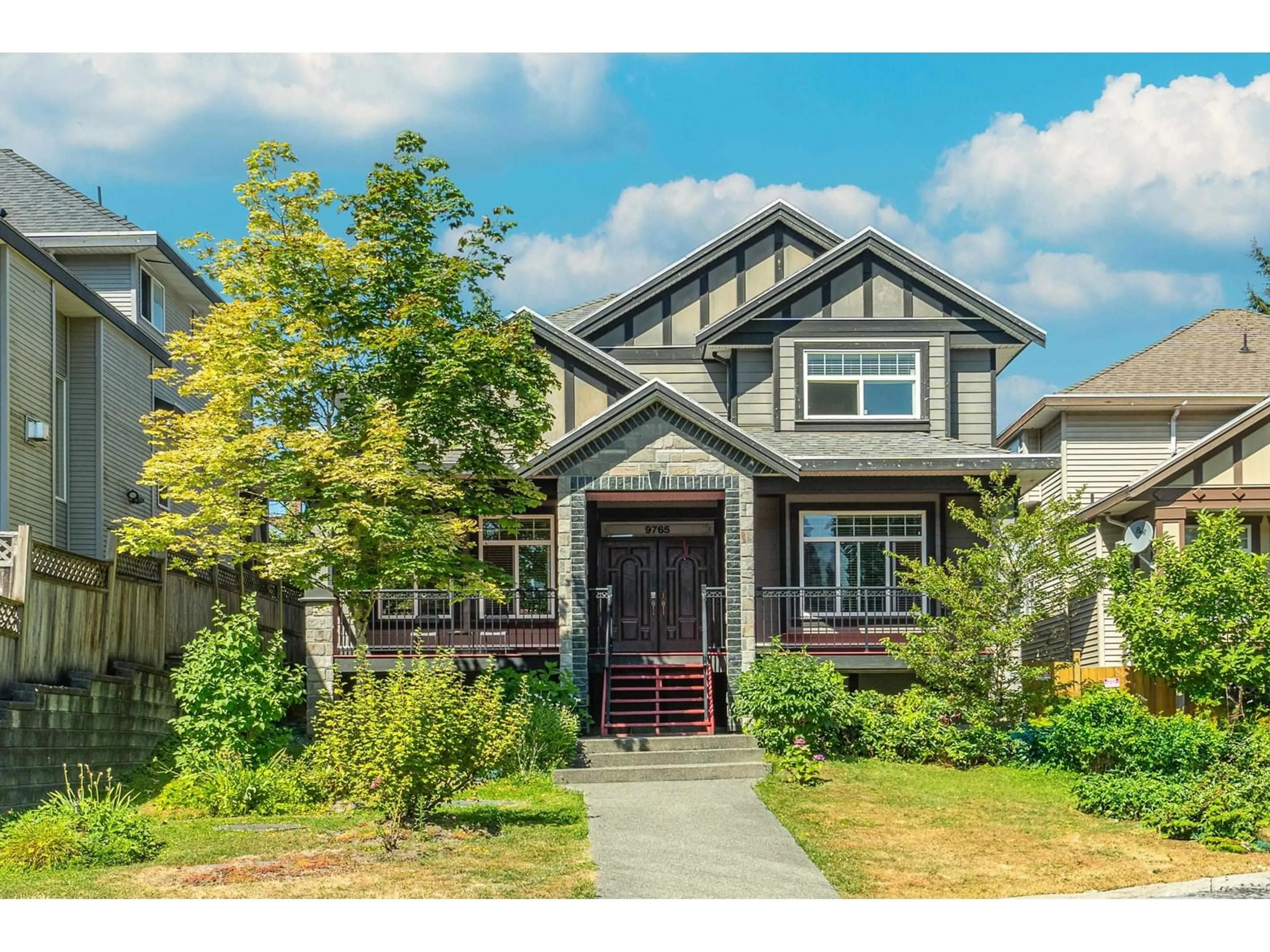 Home with vinyl exterior material, street for 9765 160A, Surrey British Columbia V4N5M1