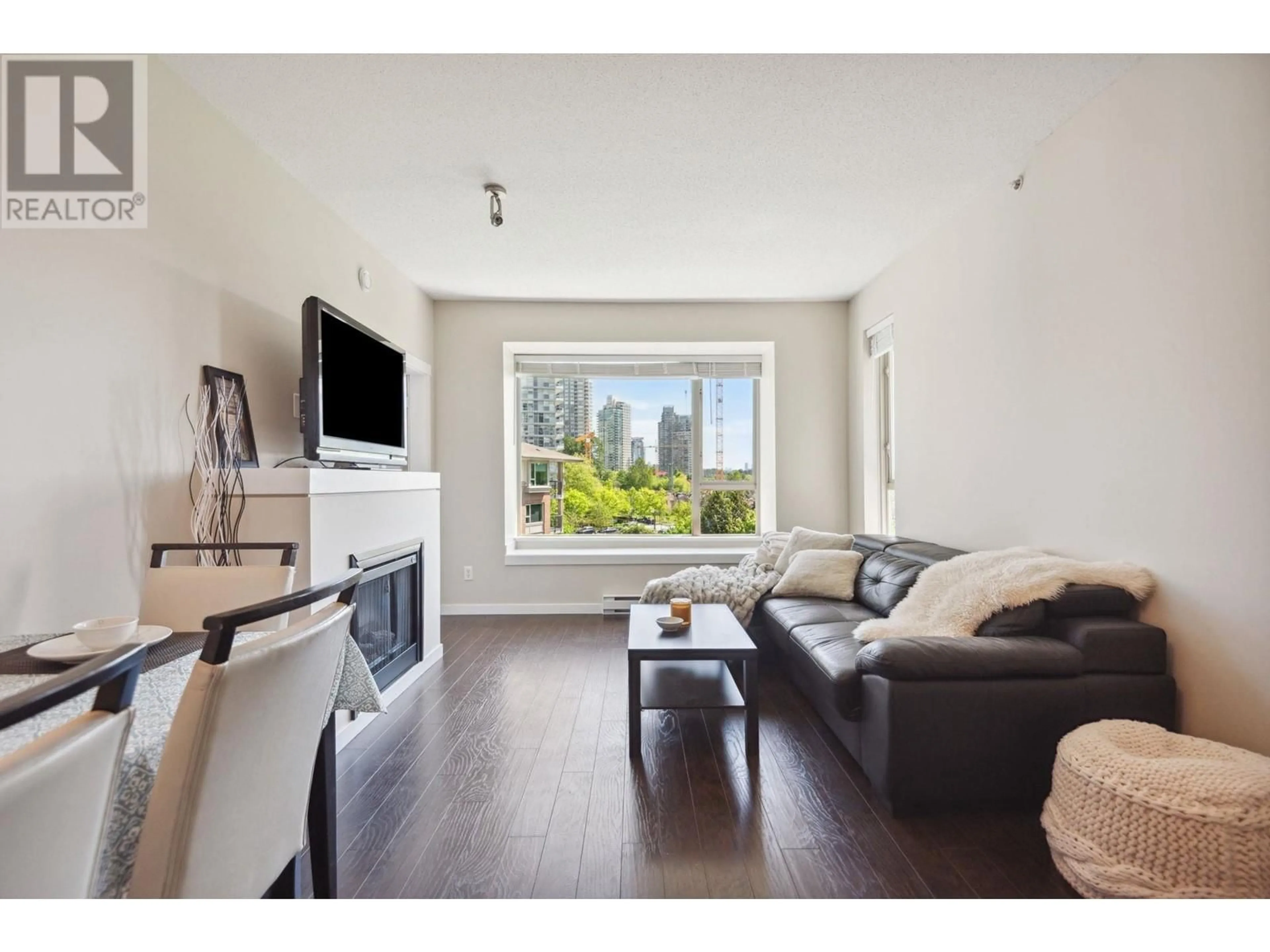 Living room with furniture, wood/laminate floor for 403 - 4728 DAWSON STREET, Burnaby British Columbia V5C0A9