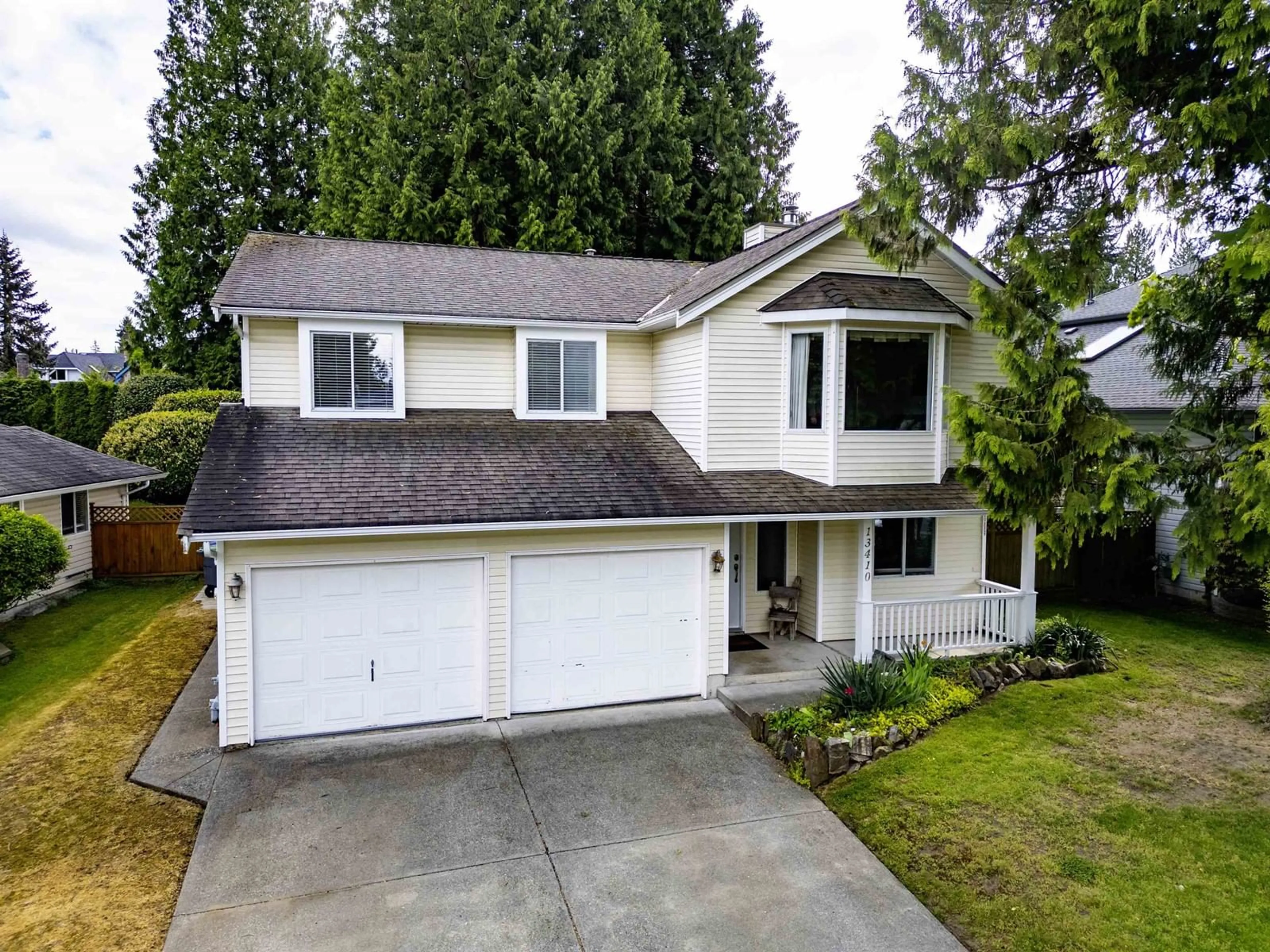 Home with vinyl exterior material, street for 13410 61, Surrey British Columbia V3X1M1