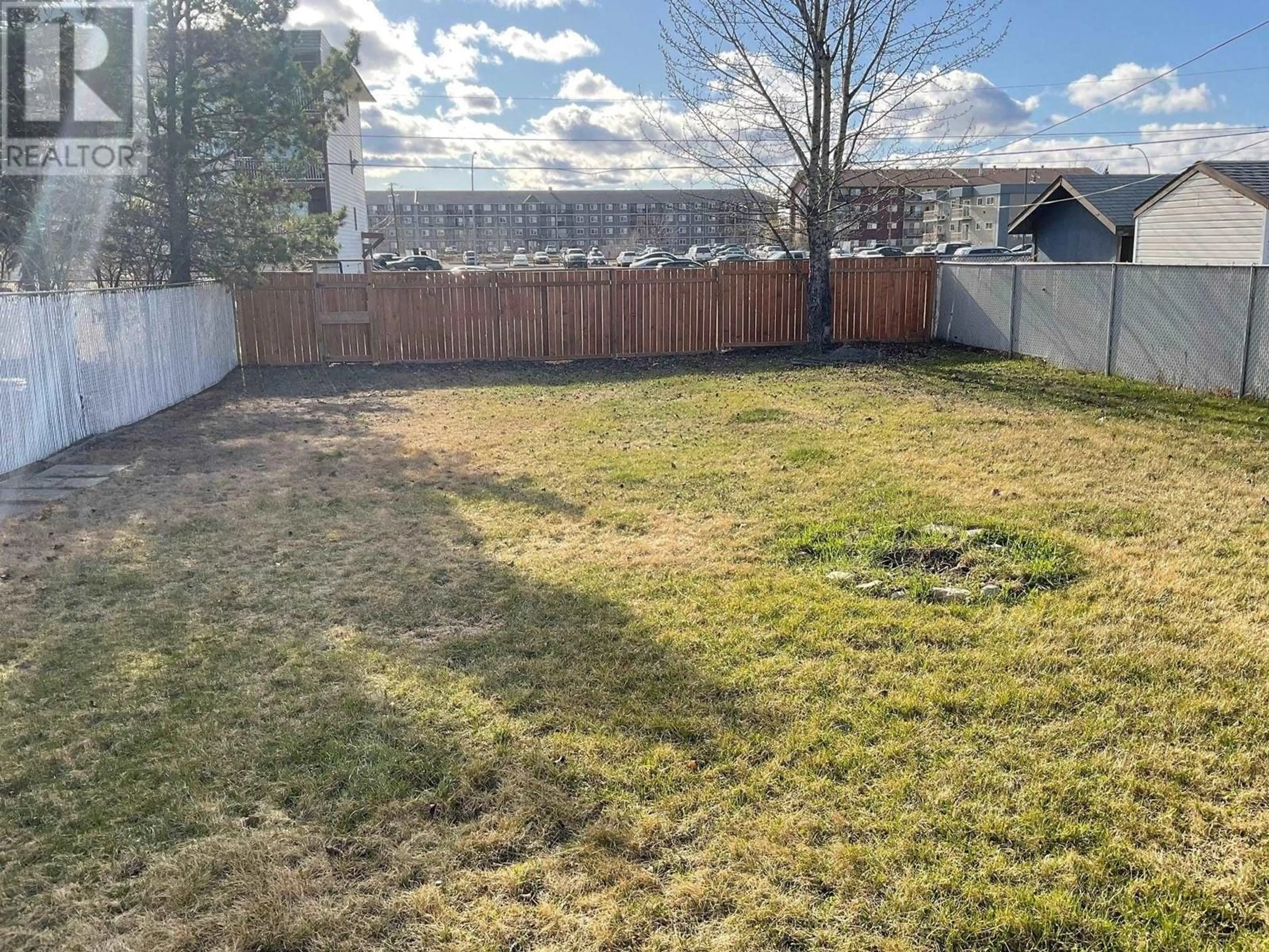 A pic from outside/outdoor area/front of a property/back of a property/a pic from drone, unknown for 9120 92A STREET, Fort St. John British Columbia V1J4P1