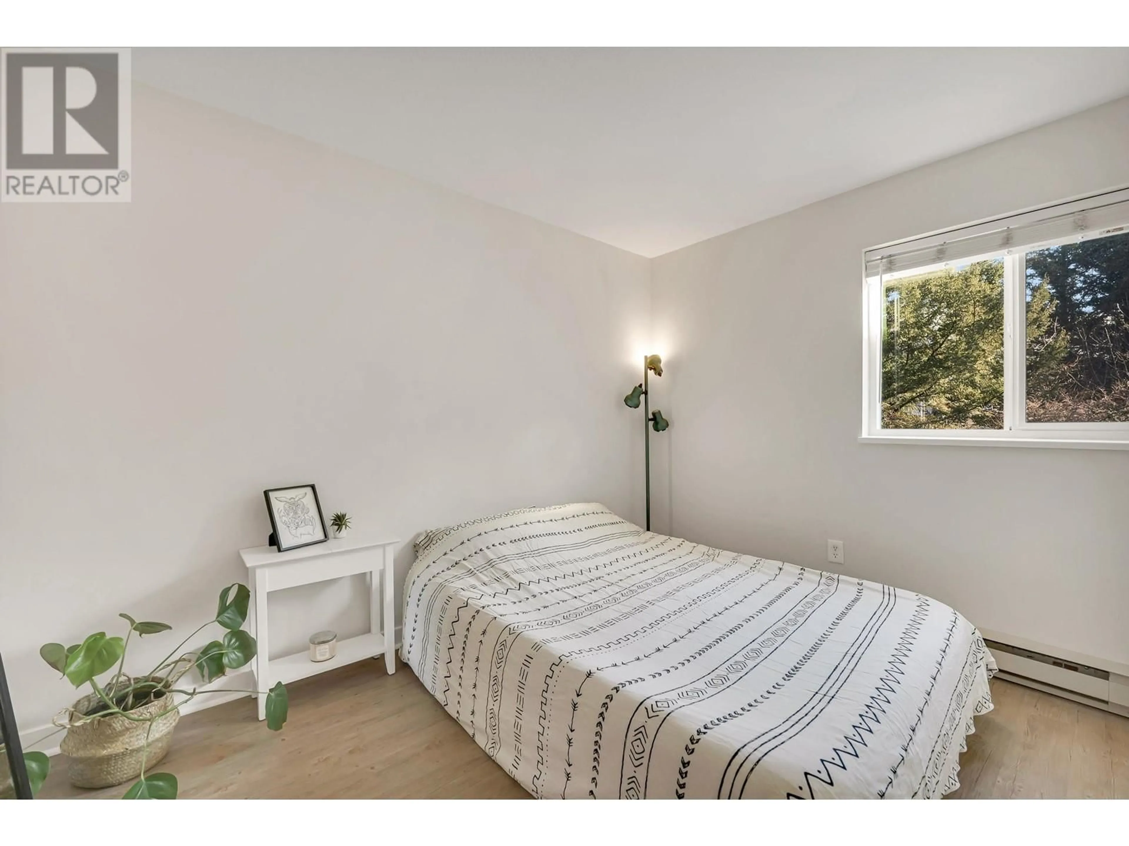 Bedroom with bed, unknown for A208 - 40100 WILLOW CRESCENT, Squamish British Columbia V8B0L8