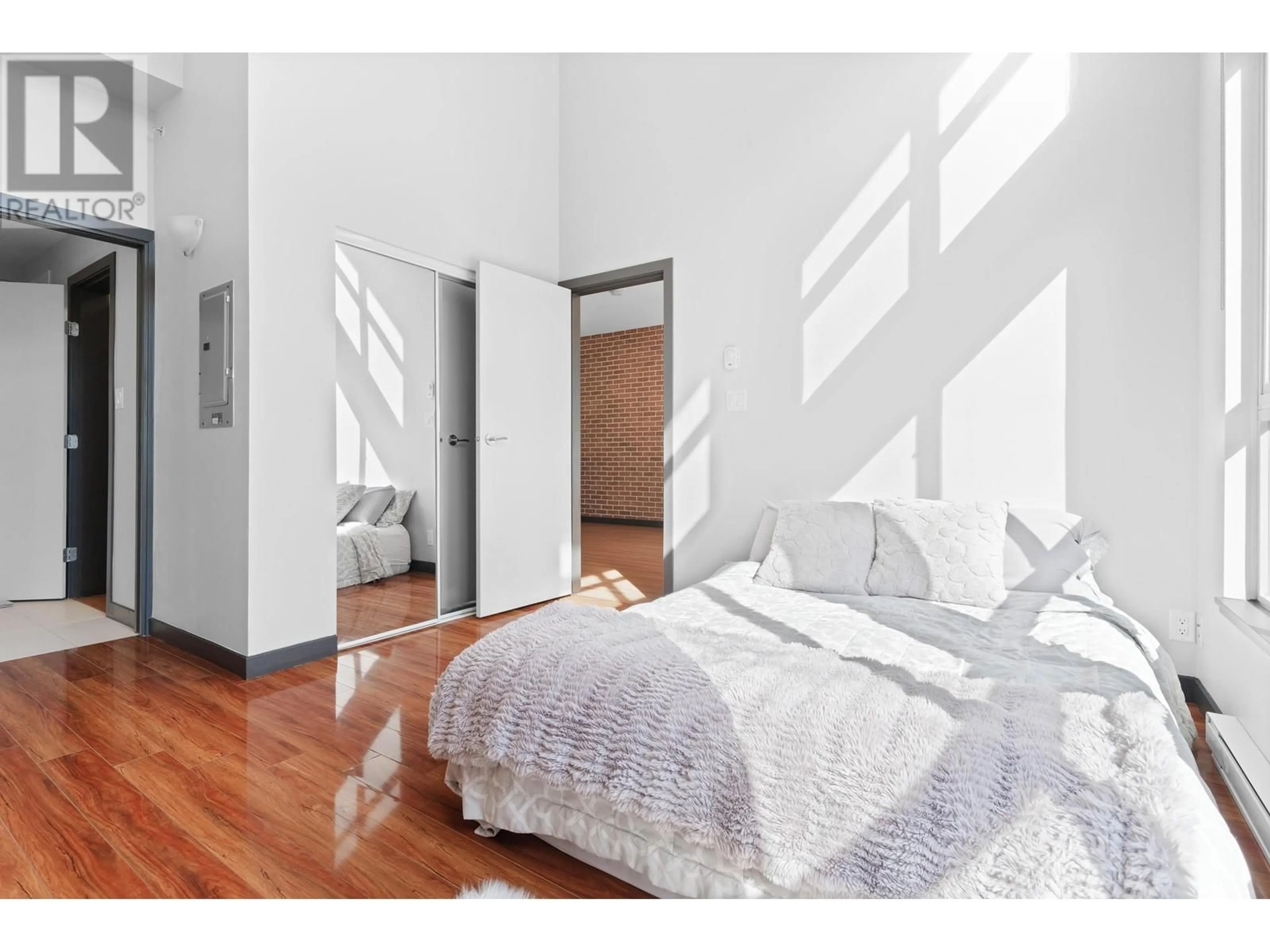 Bedroom with bed, unknown for 416 - 101 MORRISSEY ROAD, Port Moody British Columbia V3H0E6