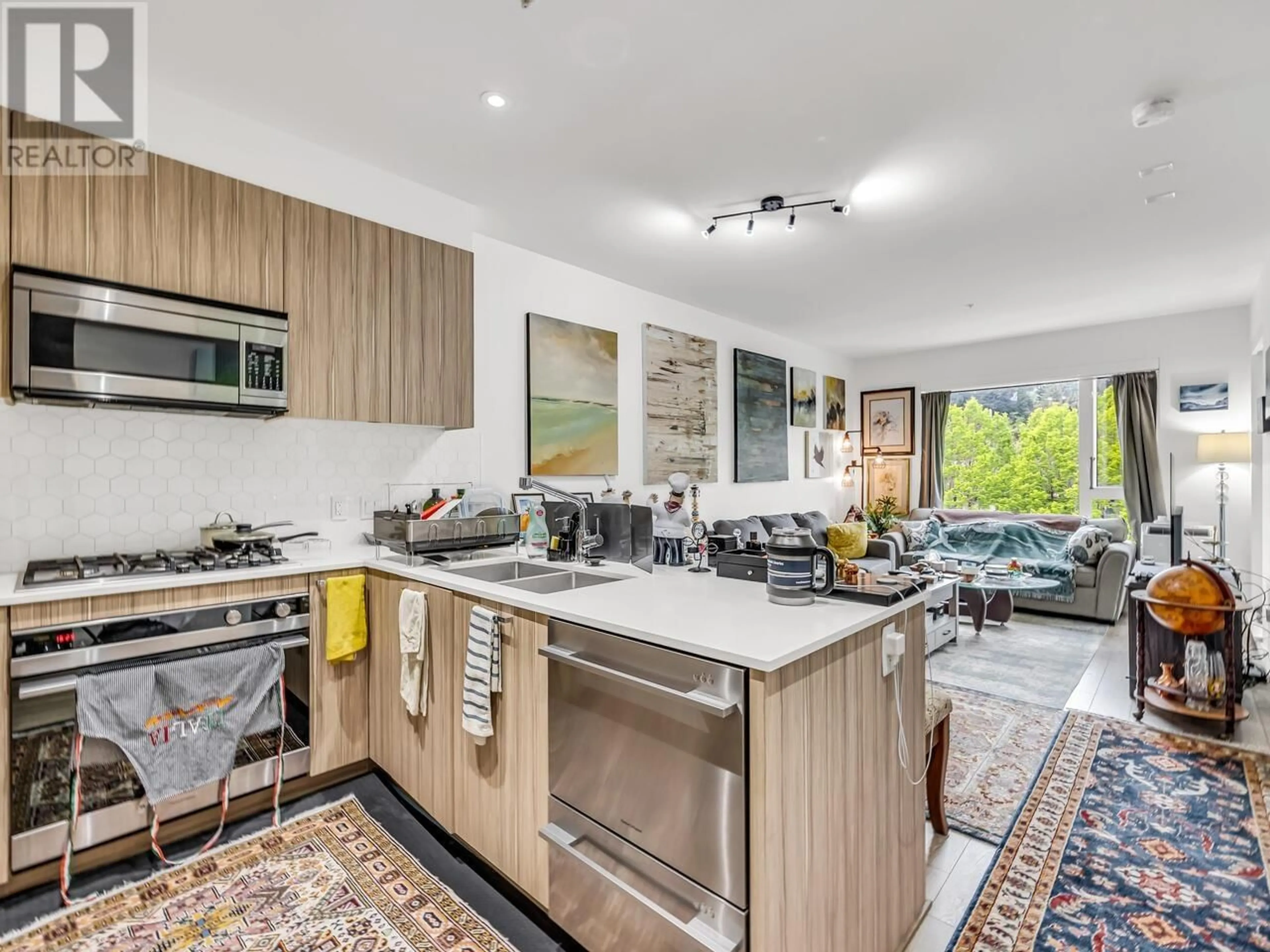 Open concept kitchen, unknown for 410 - 1061 MARINE DRIVE, North Vancouver British Columbia V7P1S6