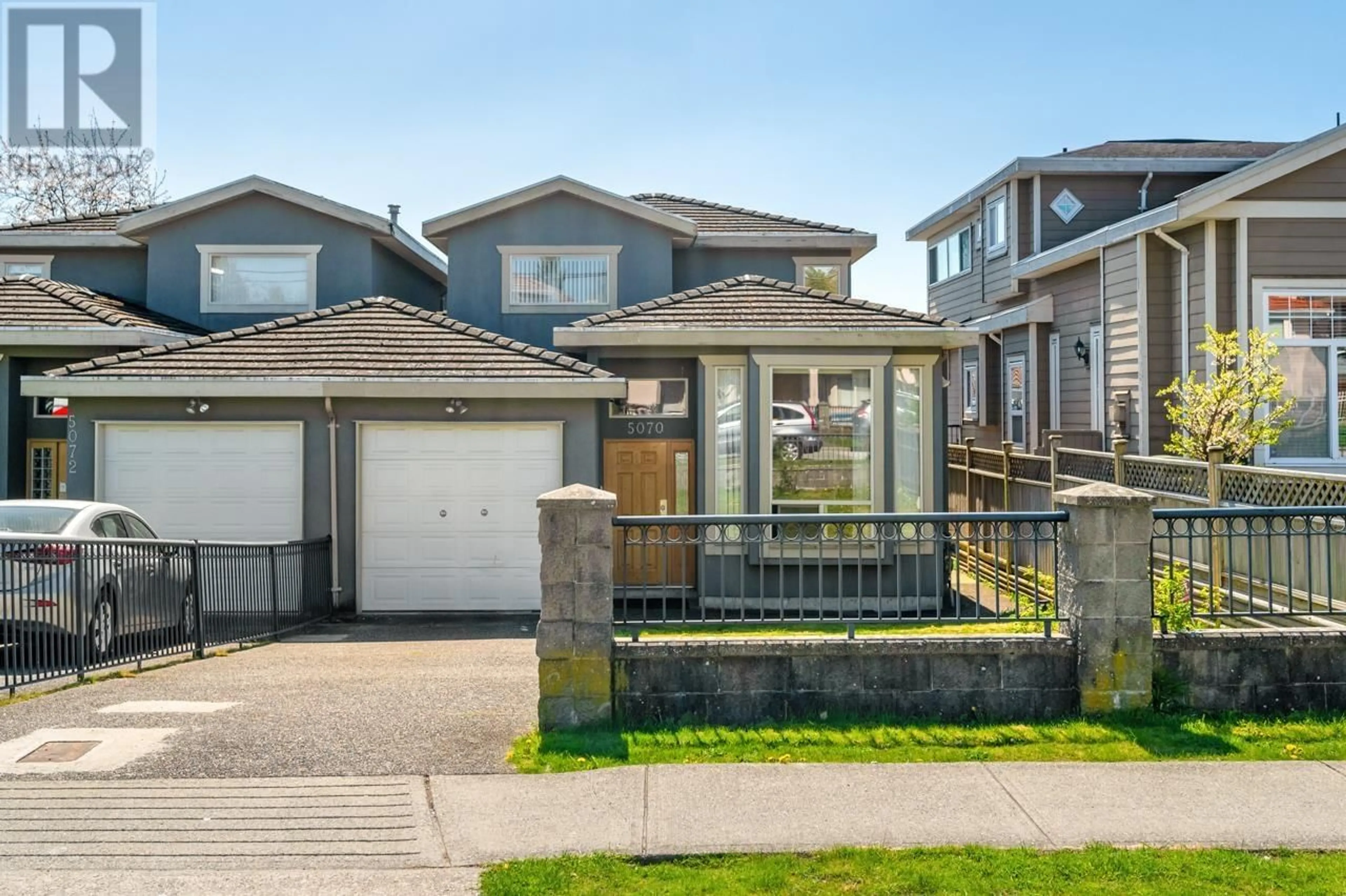Home with vinyl exterior material, street for 5070 VICTORY STREET, Burnaby British Columbia V5J1S6
