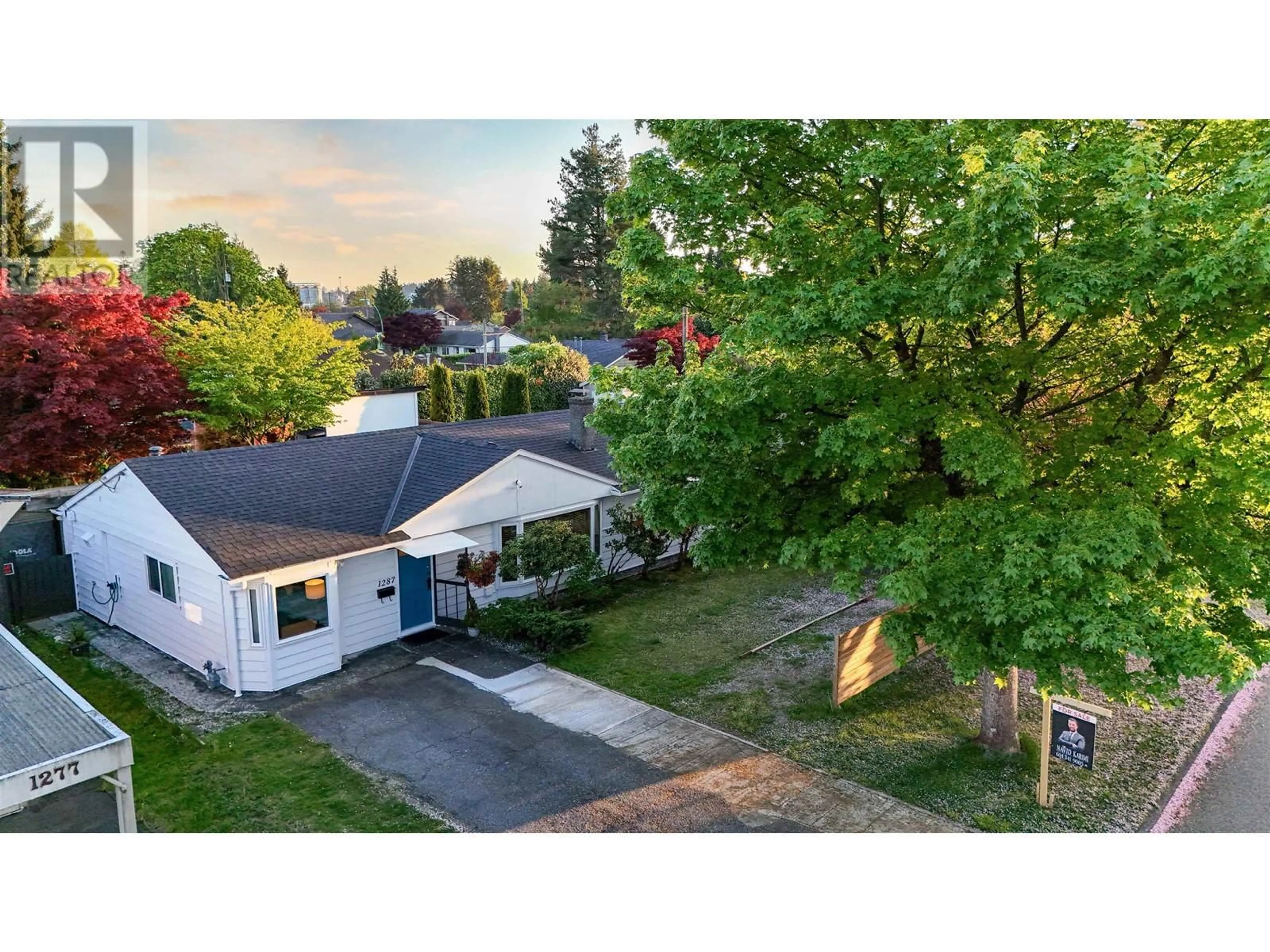 A pic from outside/outdoor area/front of a property/back of a property/a pic from drone, street for 1287 15TH STREET, North Vancouver British Columbia V7P1N1
