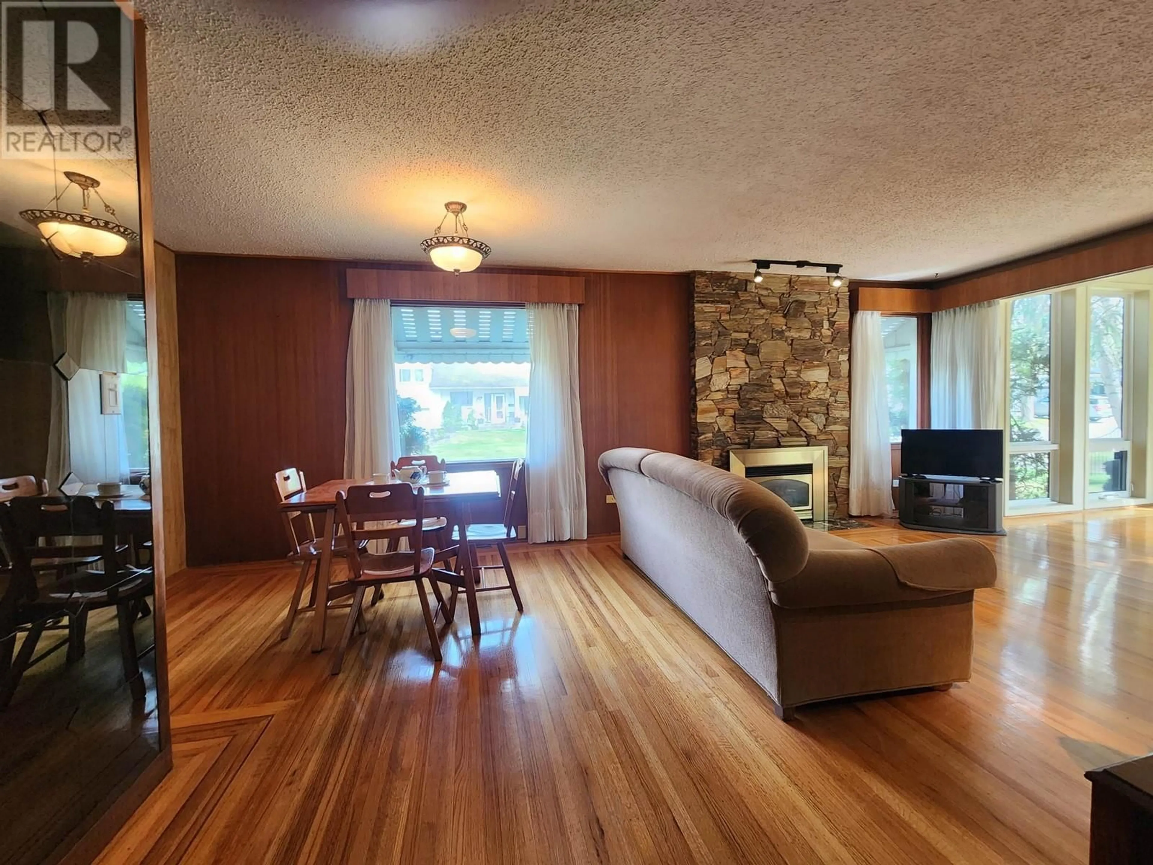 Living room with furniture, wood/laminate floor for 1591 CEDAR STREET, Prince George British Columbia V2L1B6