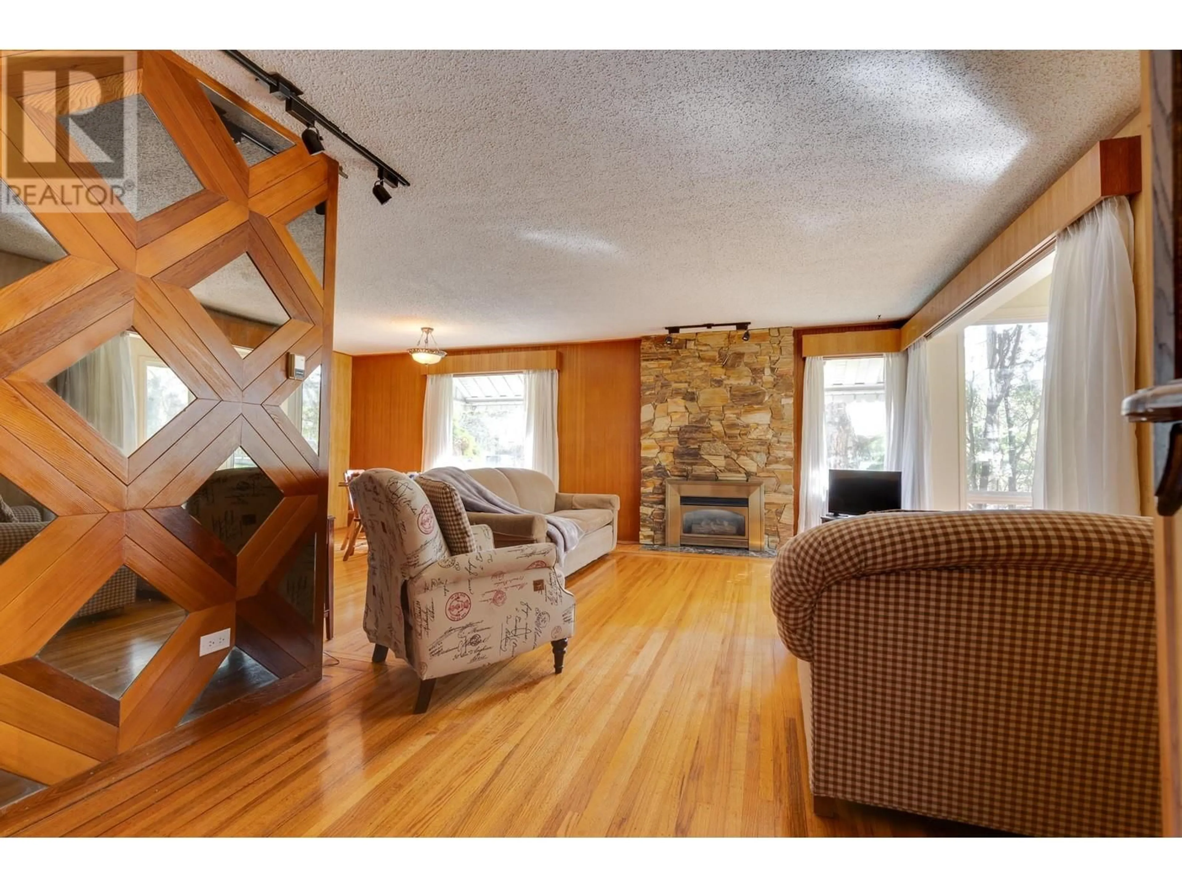 Living room with furniture, wood/laminate floor for 1591 CEDAR STREET, Prince George British Columbia V2L1B6