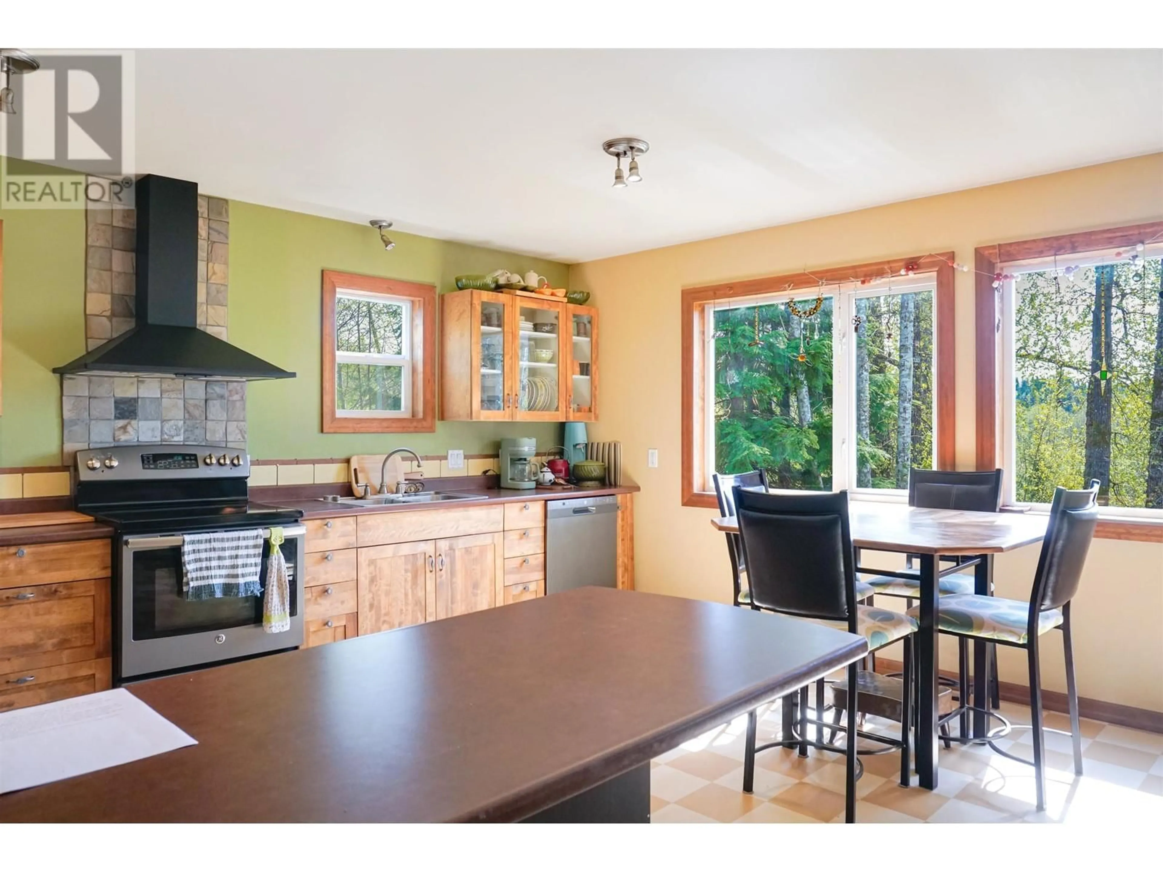 Open concept kitchen, wood/laminate floor for 4534 DUTCH VALLEY ROAD, Terrace British Columbia V8G0B9
