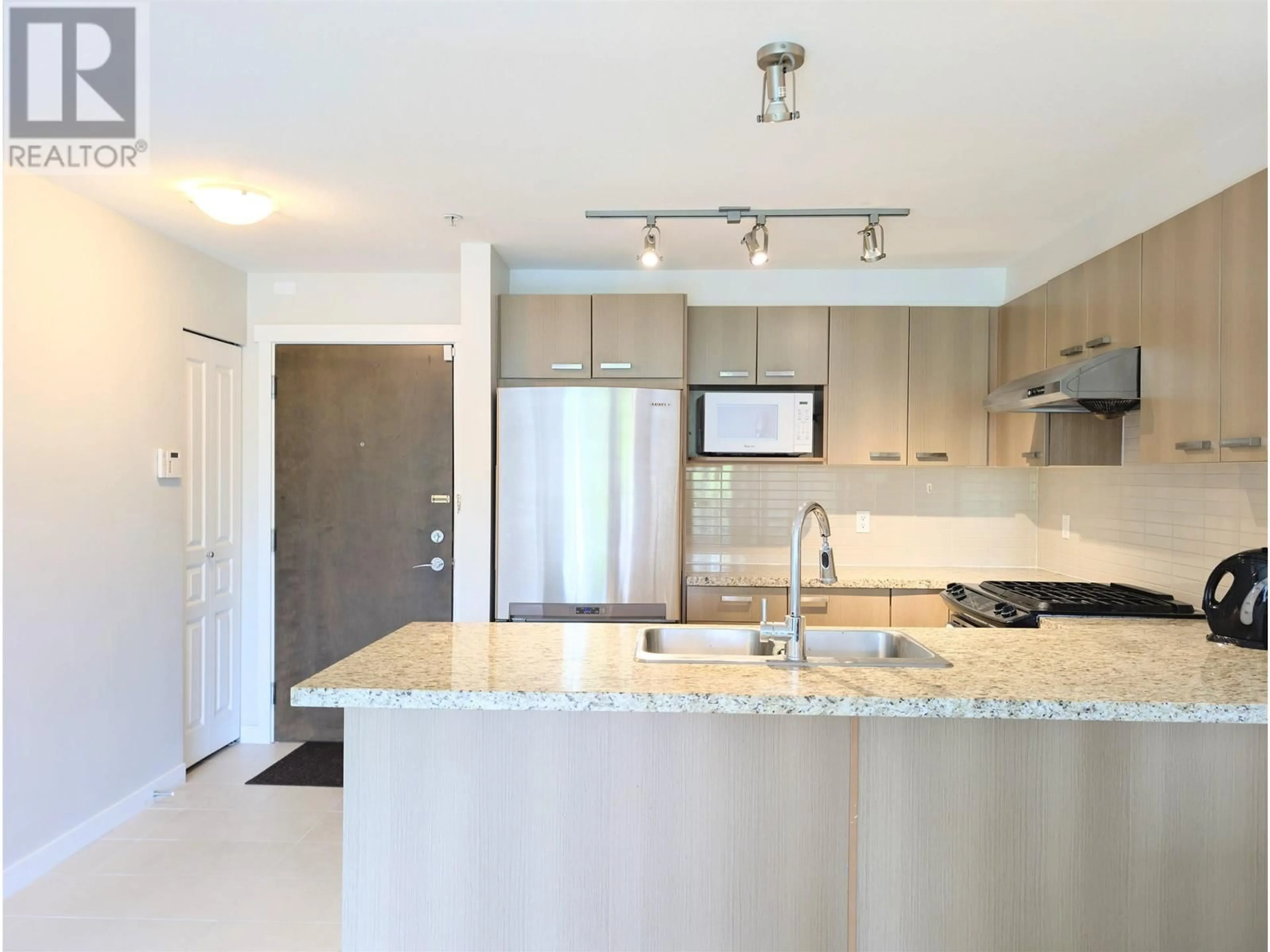 Open concept kitchen, unknown for 235 - 9500 ODLIN ROAD, Richmond British Columbia V6X0H5