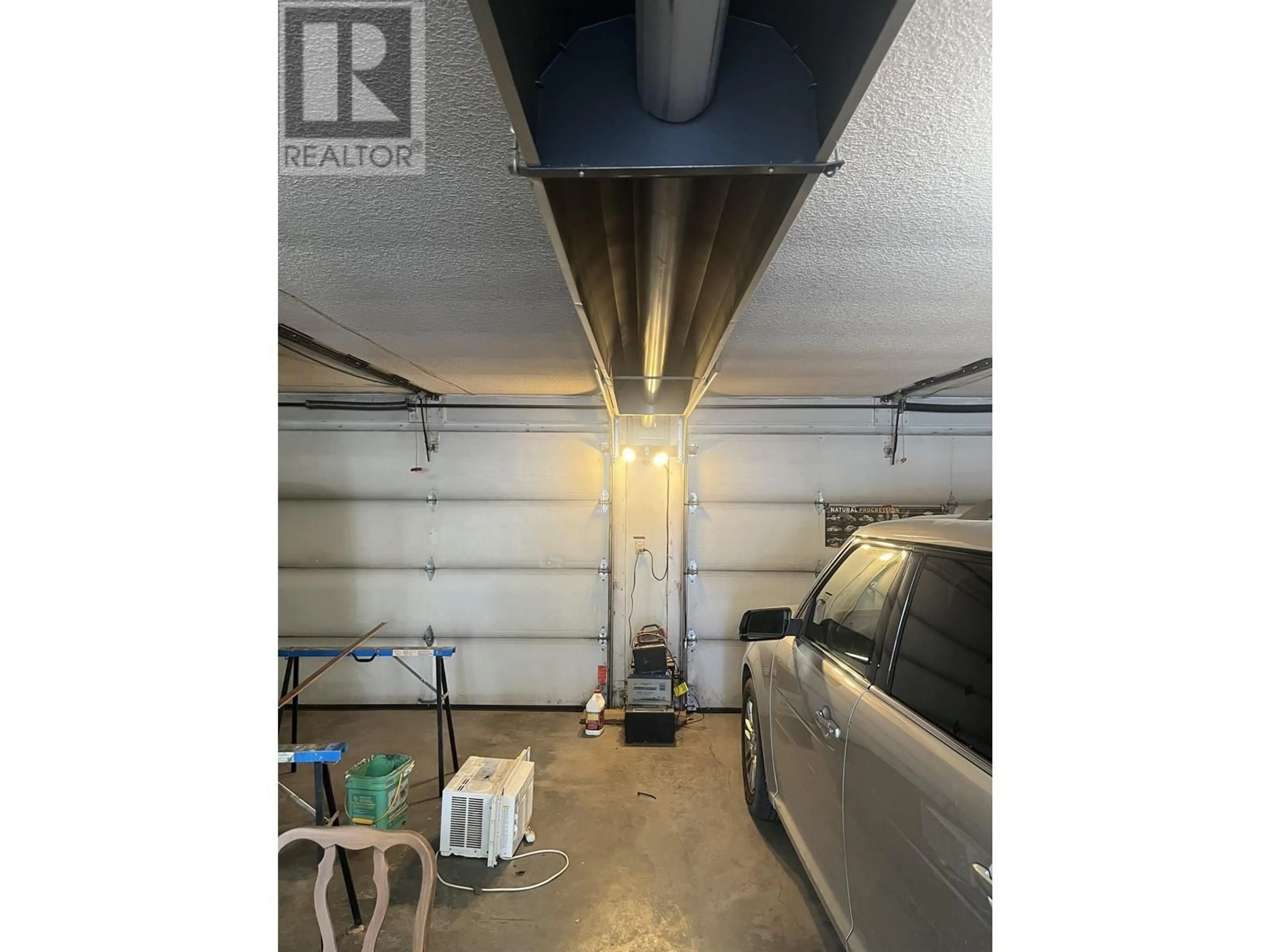 Indoor garage for 9711 108 AVENUE, Fort St. John British Columbia V1J2P9