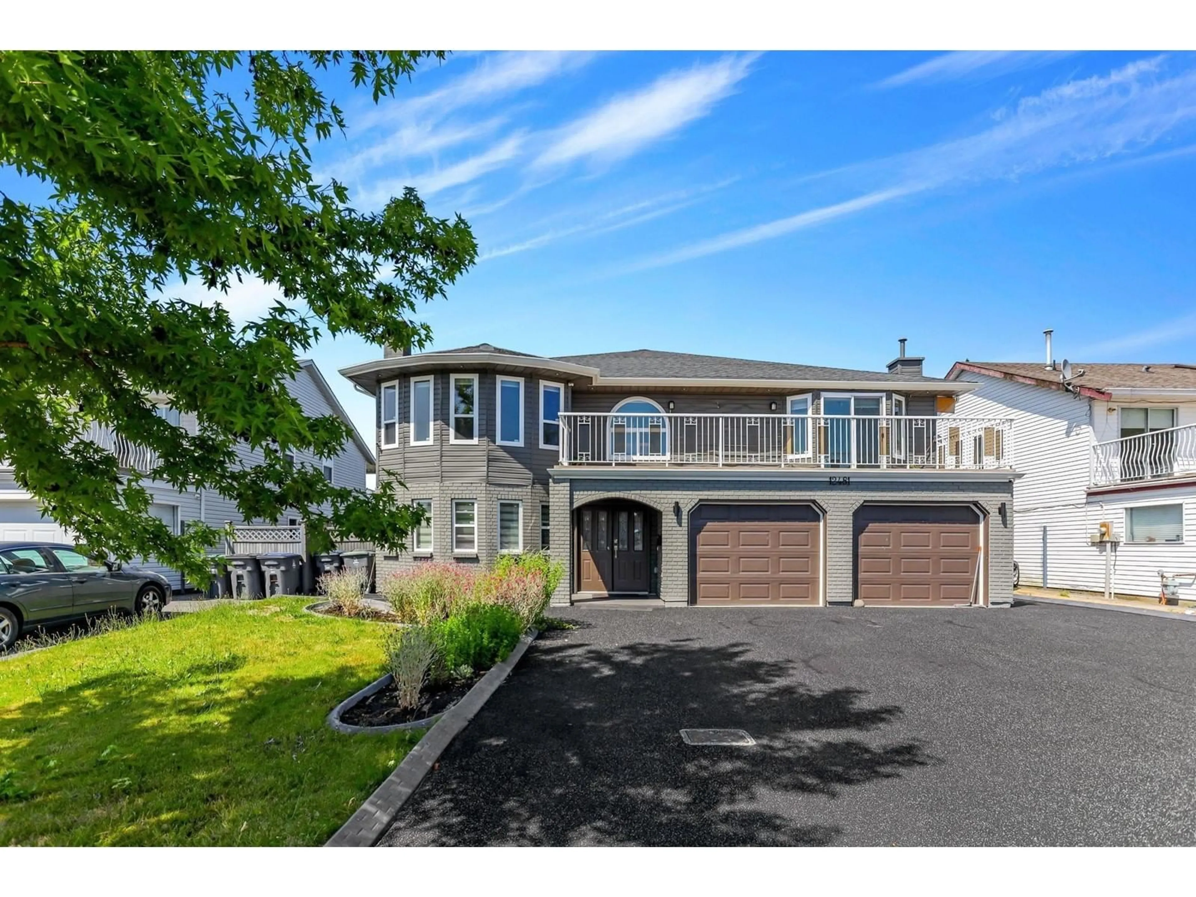 Home with vinyl exterior material, street for 12481 75A, Surrey British Columbia V3W0M3
