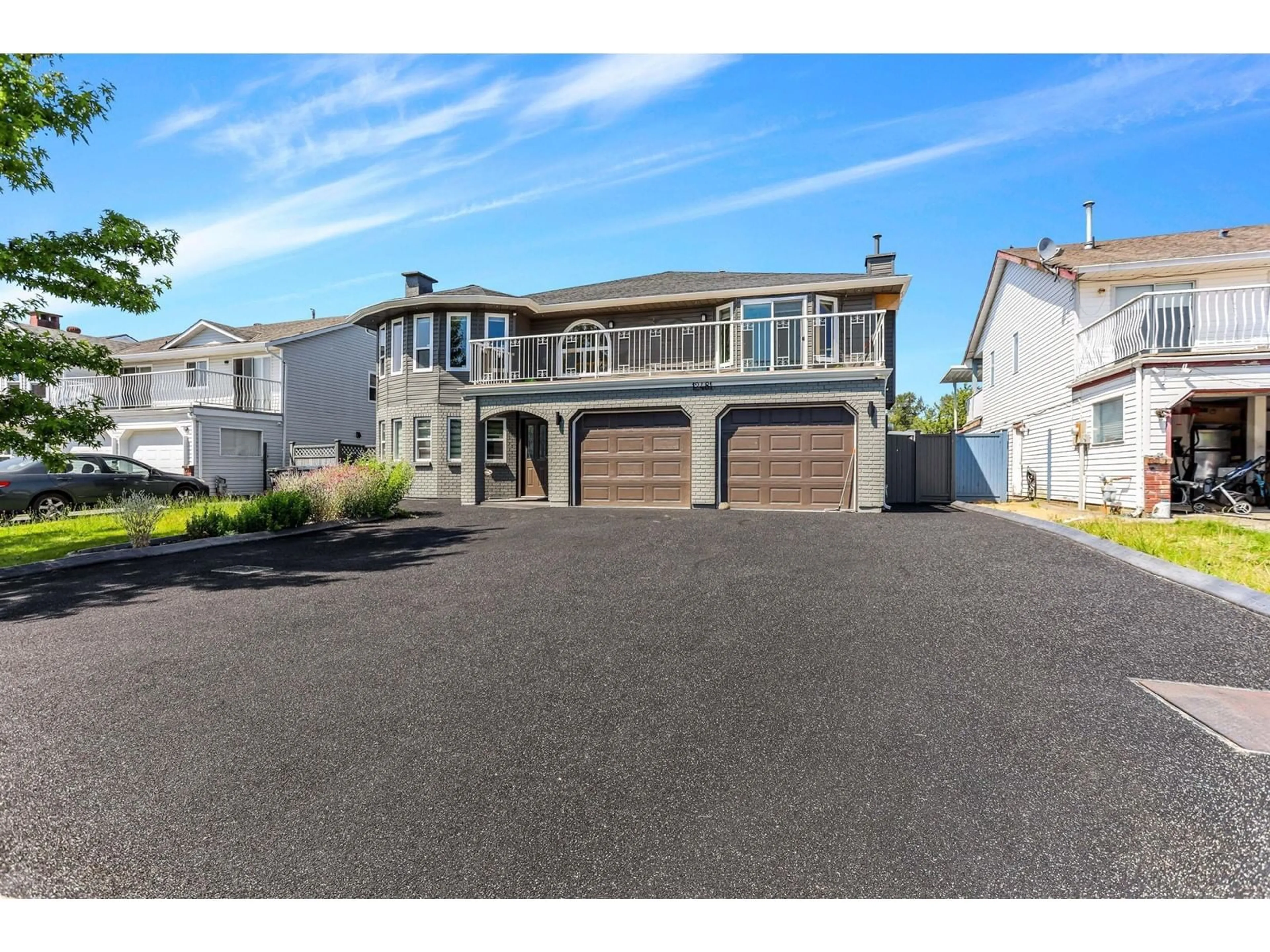Home with vinyl exterior material, street for 12481 75A, Surrey British Columbia V3W0M3