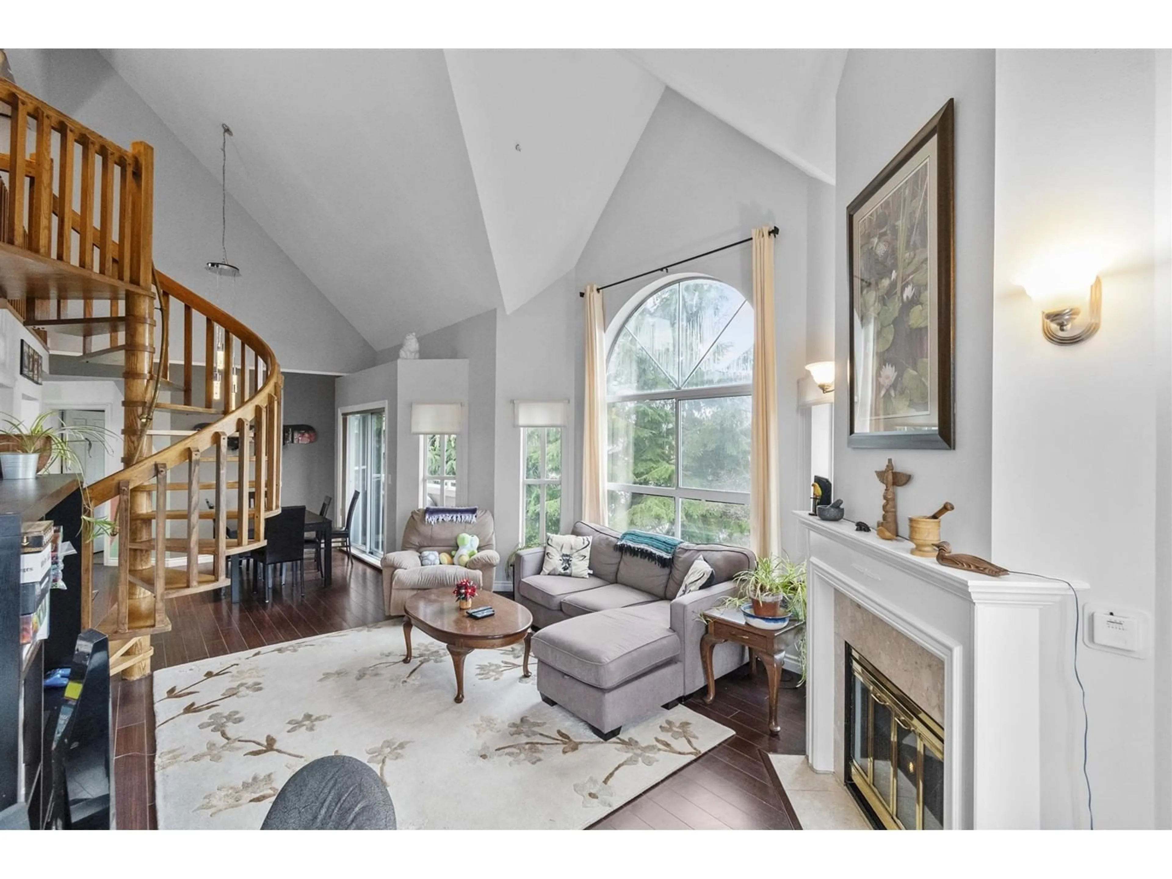 Living room with furniture, wood/laminate floor for 316 - 7151 121, Surrey British Columbia V3W0E7