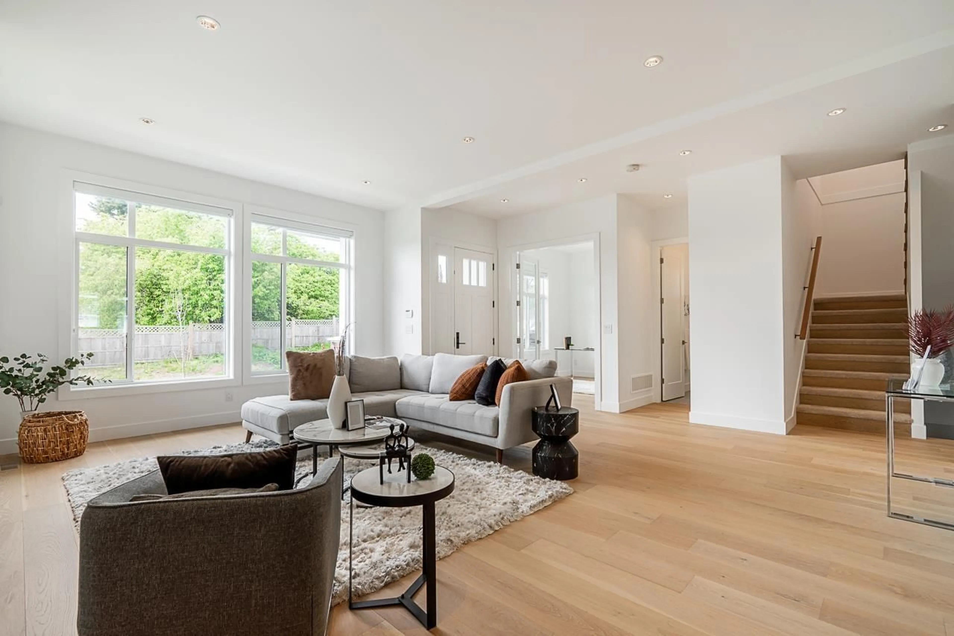 Living room with furniture, wood/laminate floor for 1916 167A, Surrey British Columbia V3Z1A2