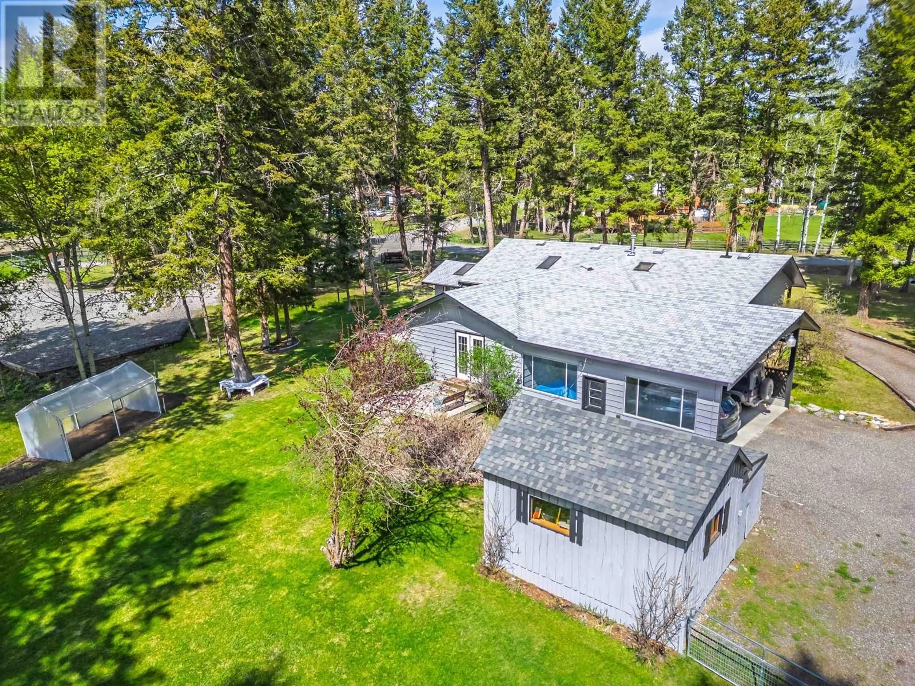 A pic from outside/outdoor area/front of a property/back of a property/a pic from drone, unknown for 5056 KINNCUM ROAD, 108 Mile Ranch British Columbia V0K2Z0