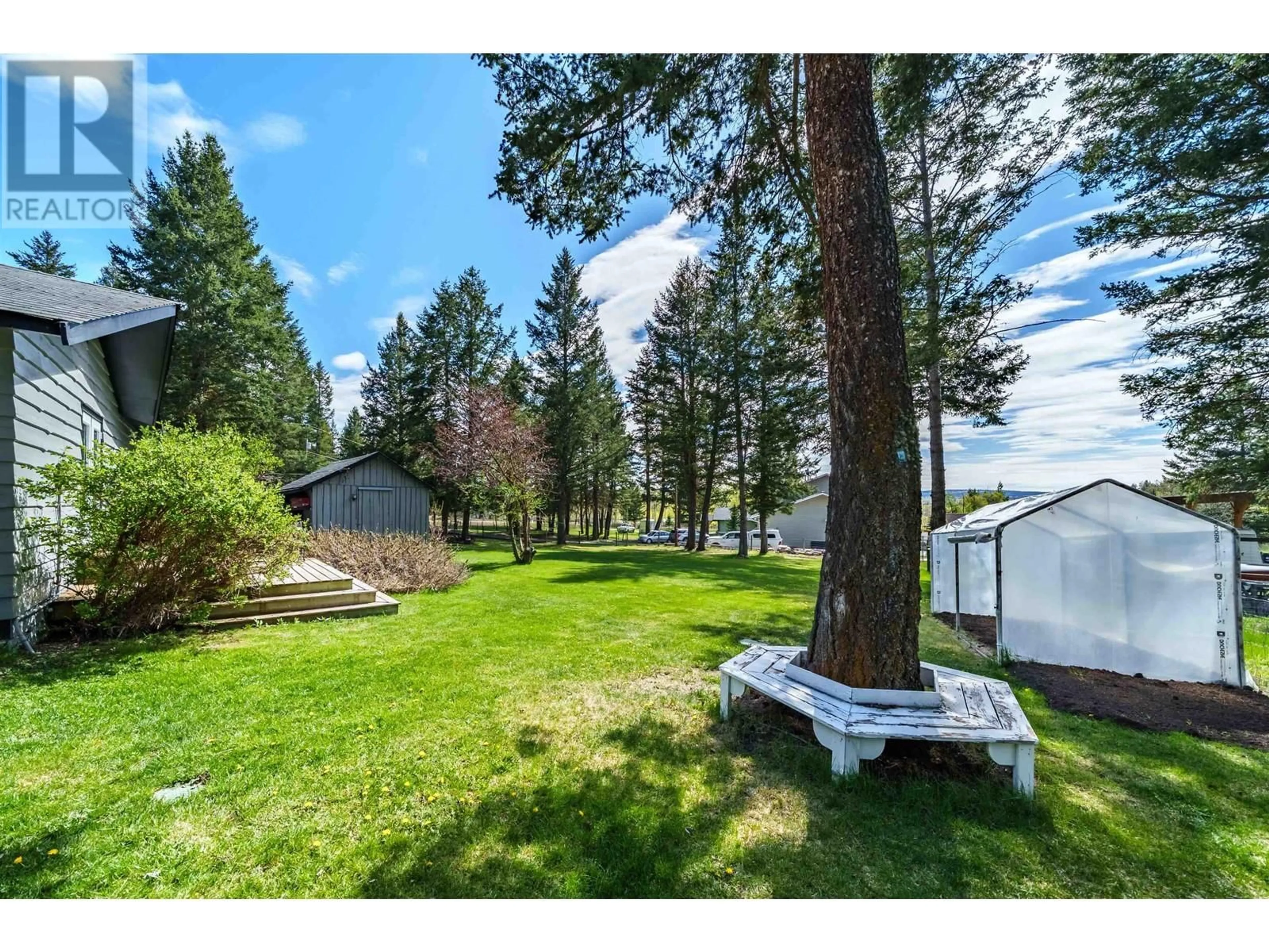 A pic from outside/outdoor area/front of a property/back of a property/a pic from drone, forest/trees view for 5056 KINNCUM ROAD, 108 Mile Ranch British Columbia V0K2Z0