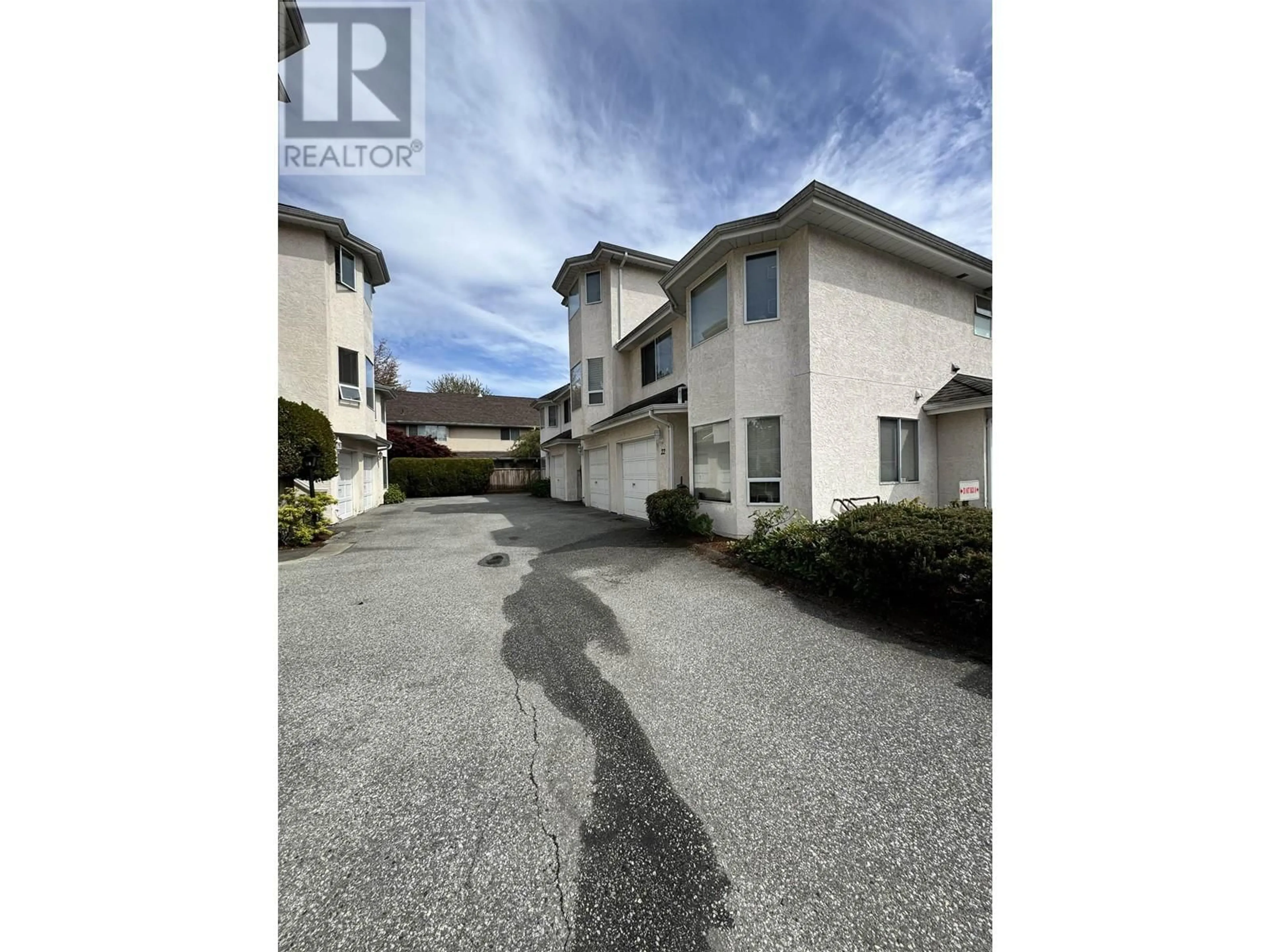 A pic from outside/outdoor area/front of a property/back of a property/a pic from drone, street for 22 - 8220 BENNETT ROAD, Richmond British Columbia V6Y1N5