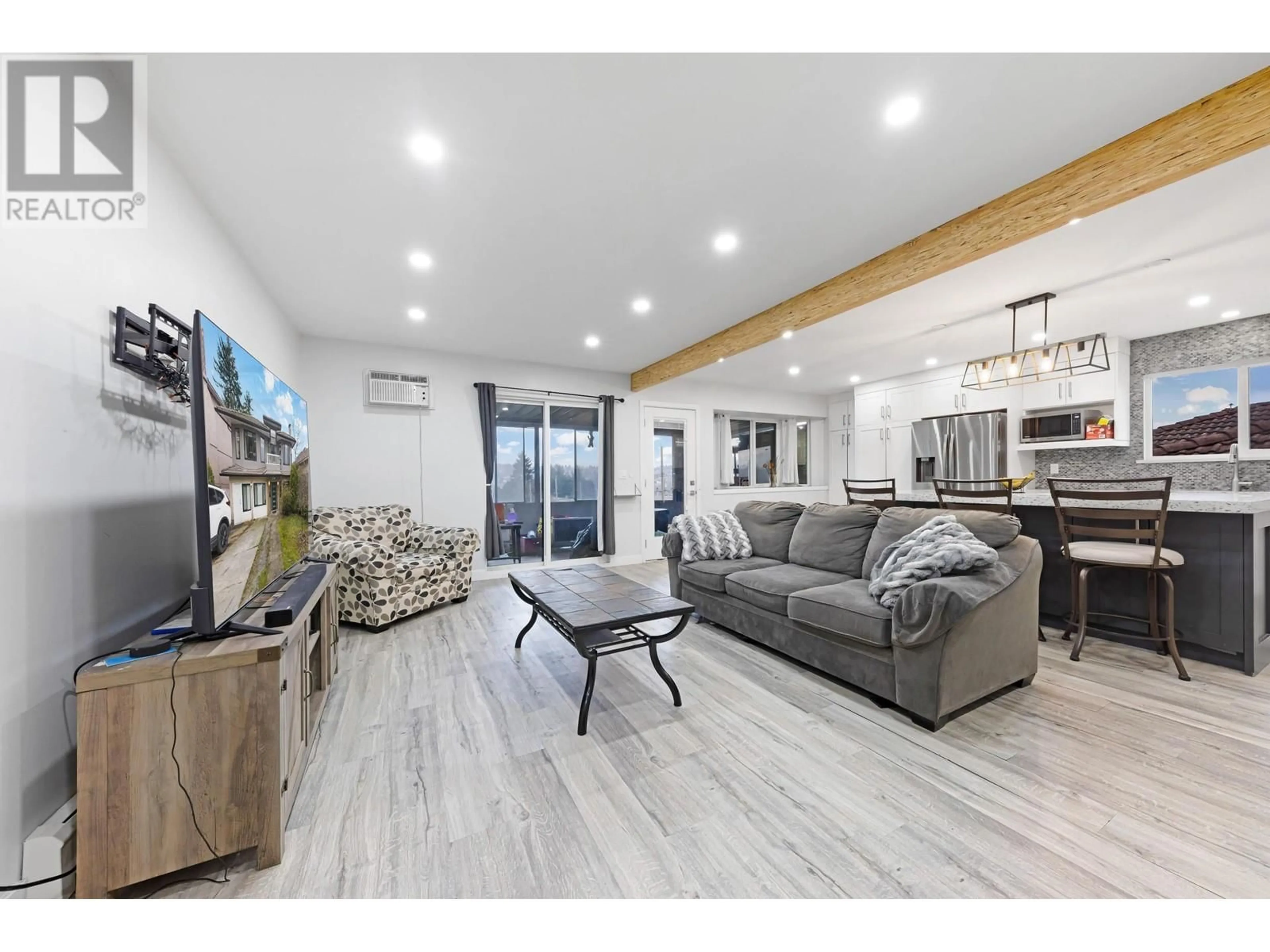 Living room with furniture, wood/laminate floor for 5649 LAUREL STREET, Burnaby British Columbia V5G1N4