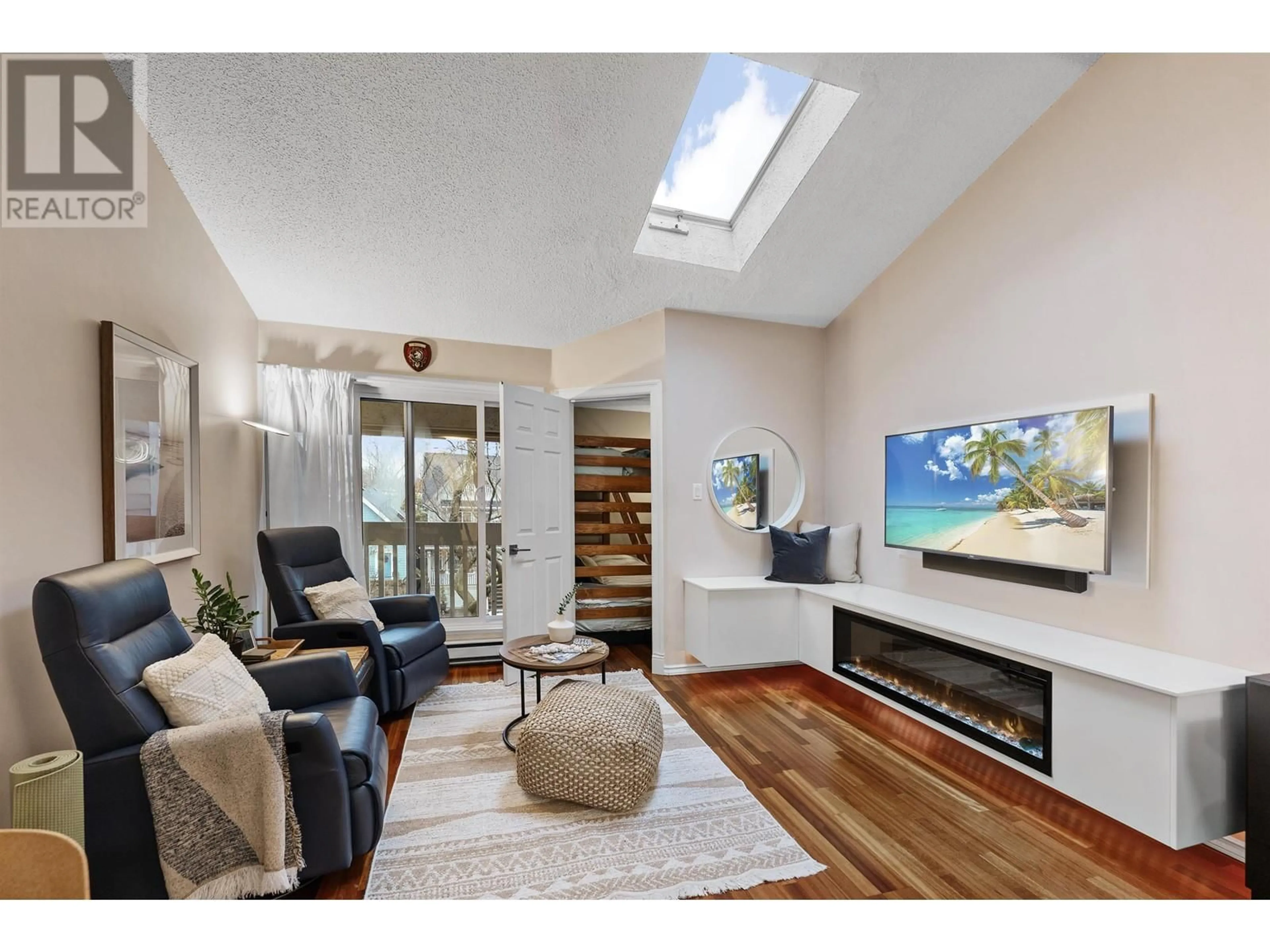 Living room with furniture, wood/laminate floor for 317 - 1545 2ND AVENUE, Vancouver British Columbia V5N1C8