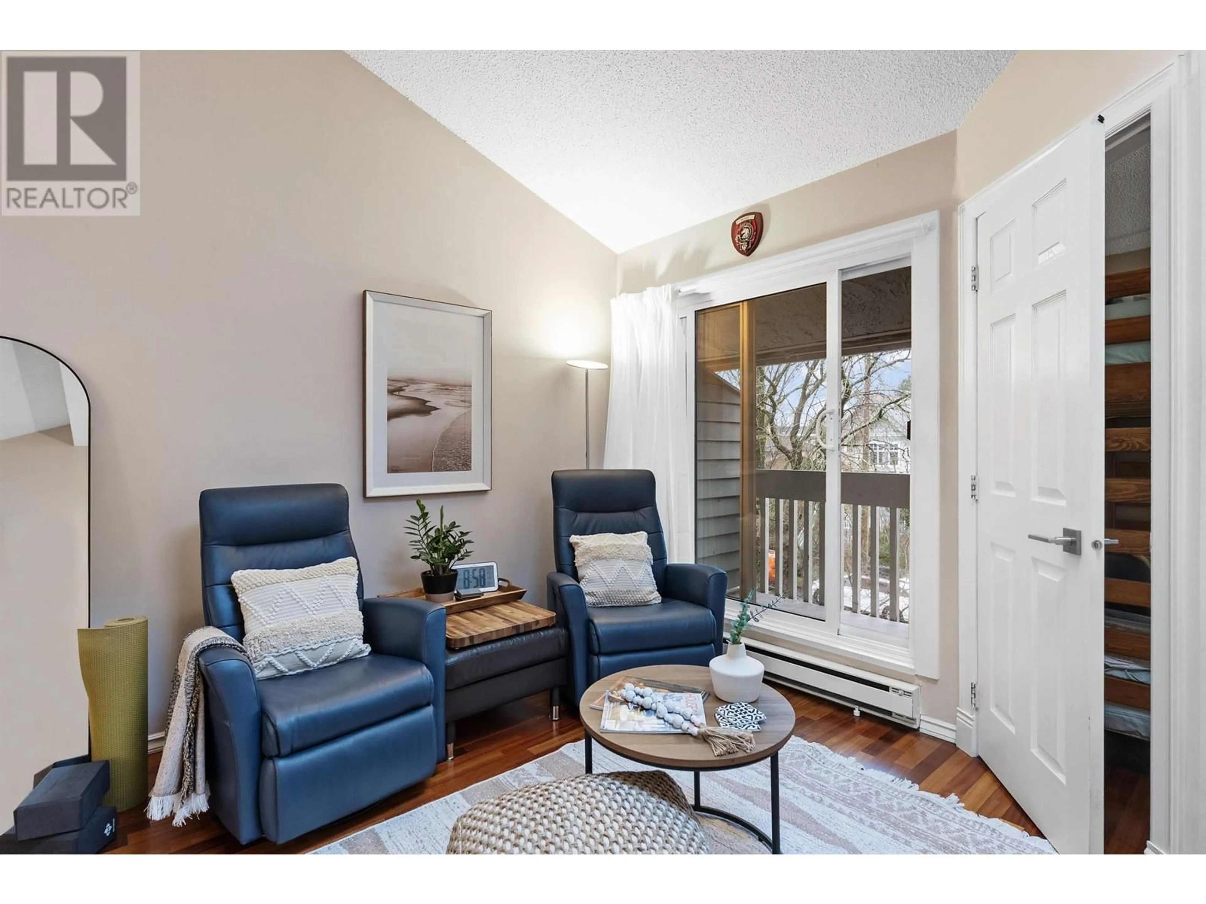 Living room with furniture, wood/laminate floor for 317 - 1545 2ND AVENUE, Vancouver British Columbia V5N1C8