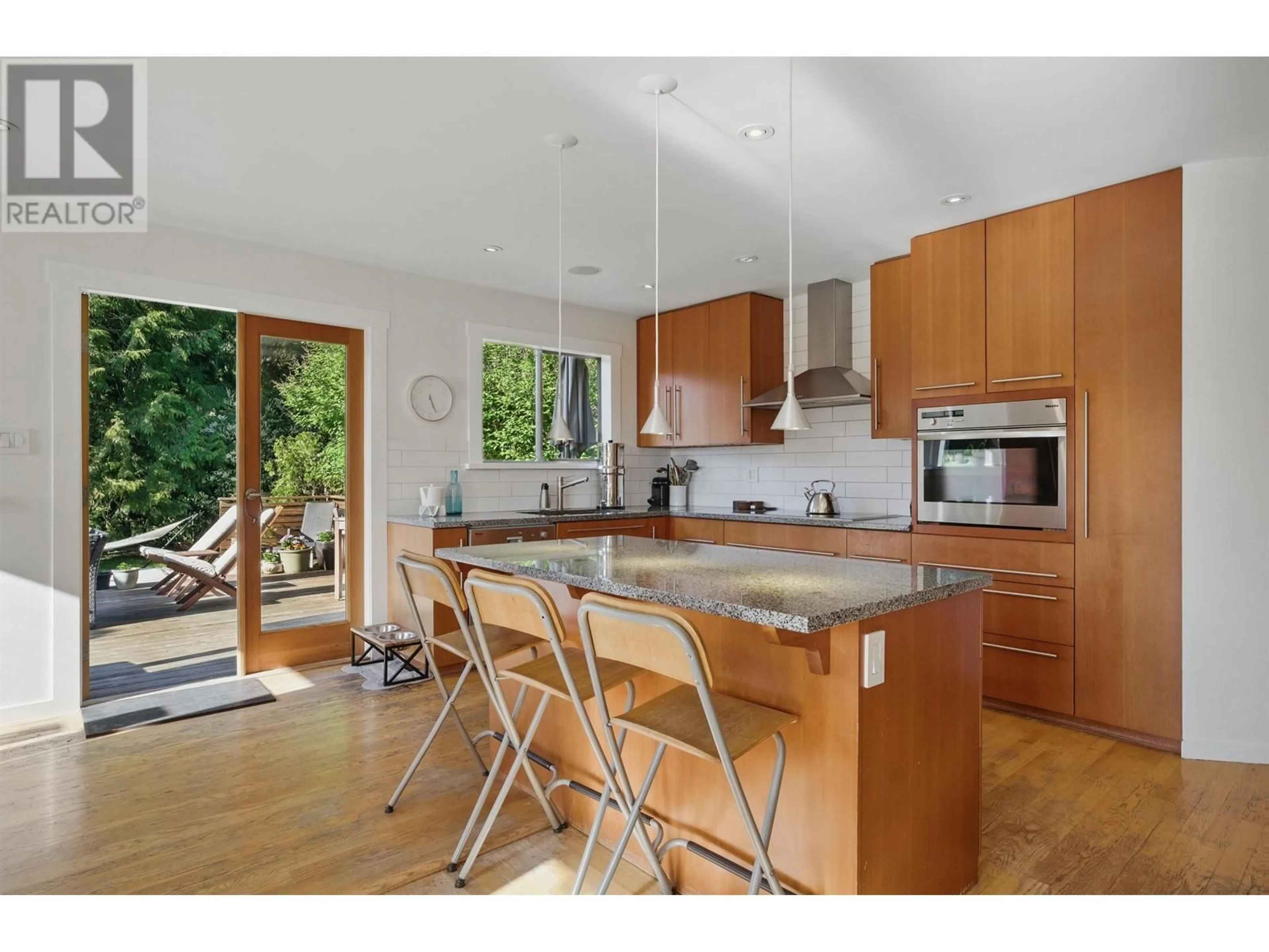 Open concept kitchen, wood/laminate floor for 806 CLEMENTS AVENUE, North Vancouver British Columbia V7R2K7