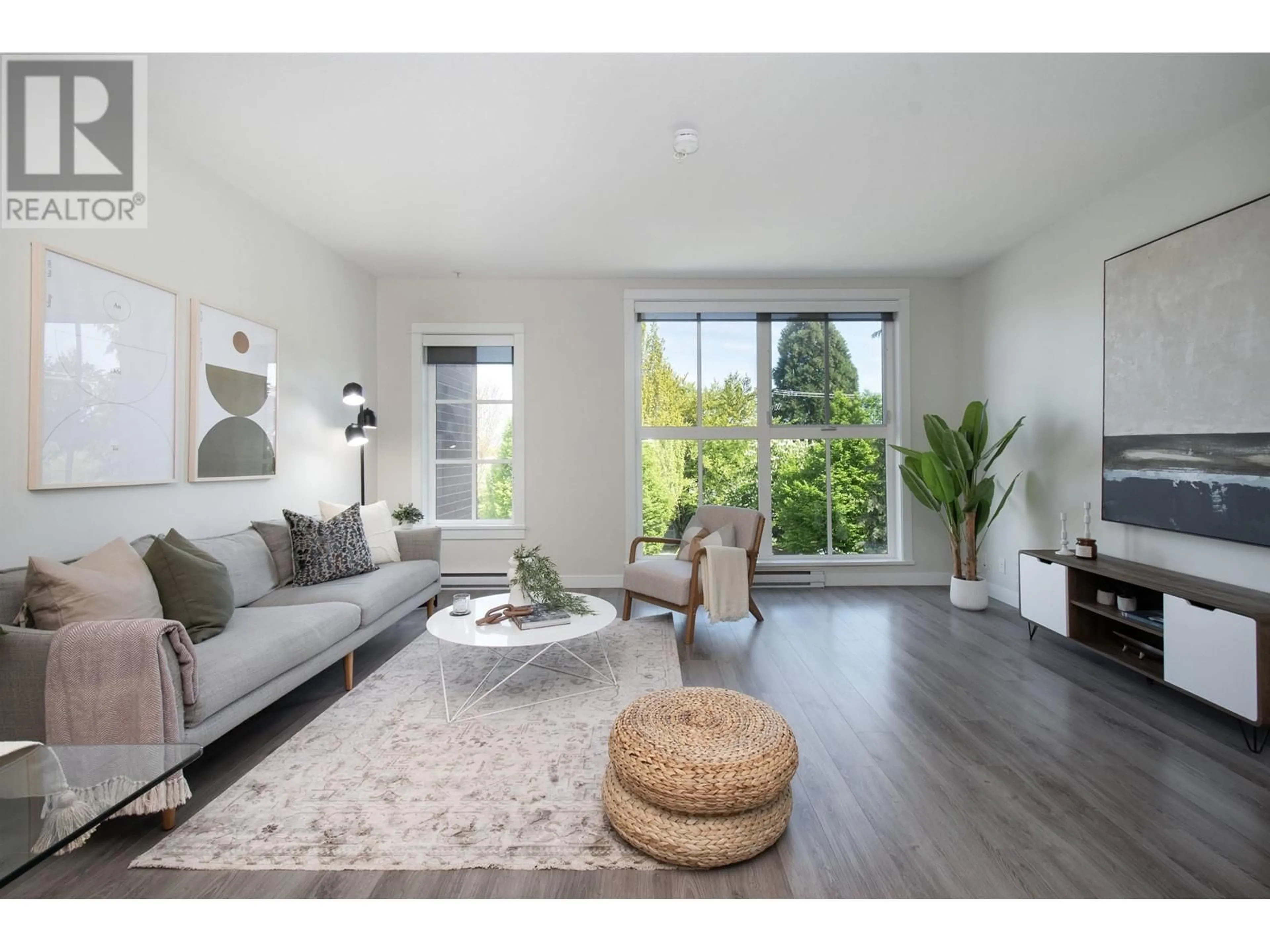 Living room with furniture, wood/laminate floor for 3433 PORTER STREET, Vancouver British Columbia V5N4H2