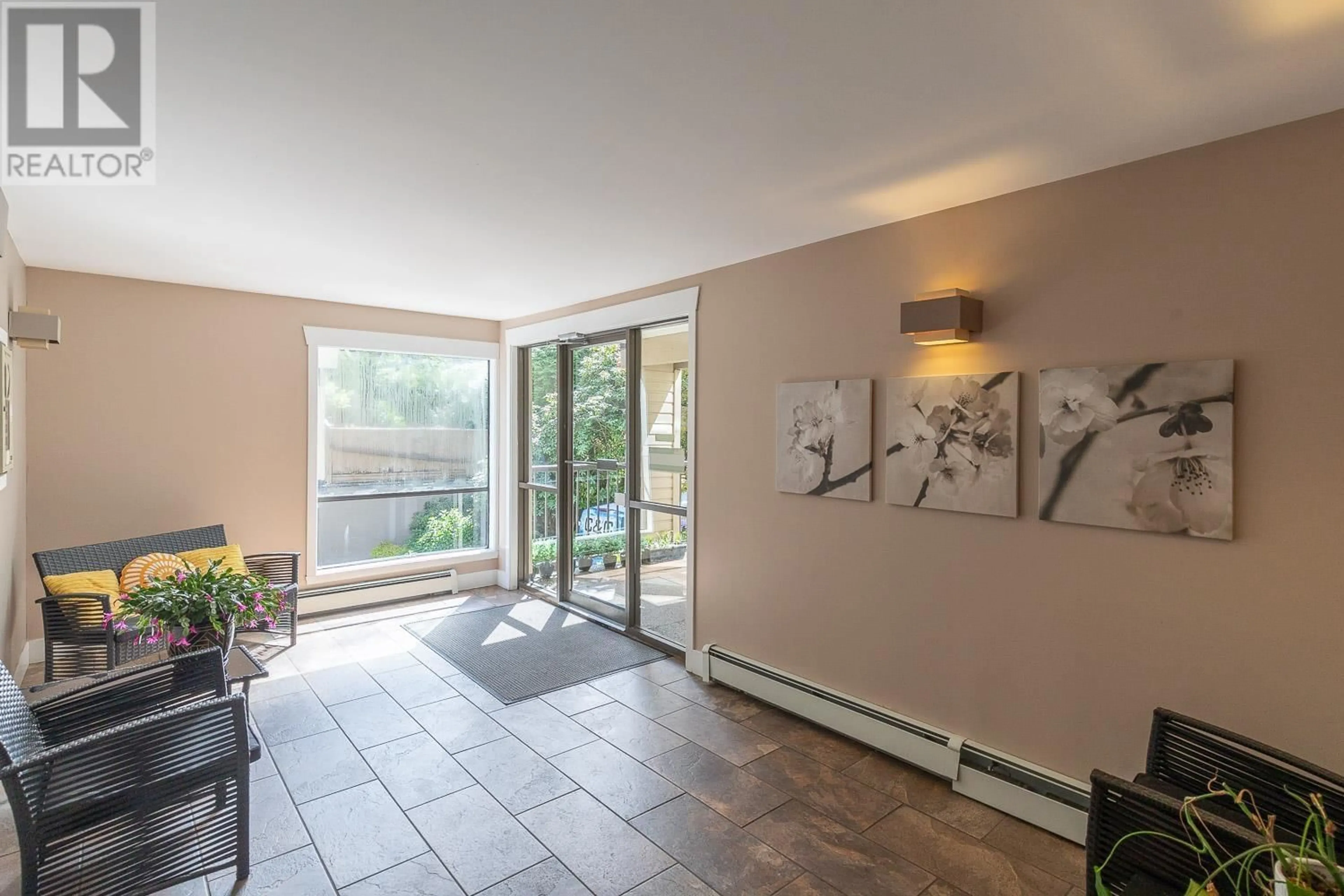 Indoor foyer for 110 - 3275 MOUNTAIN HIGHWAY, North Vancouver British Columbia V7K2H4