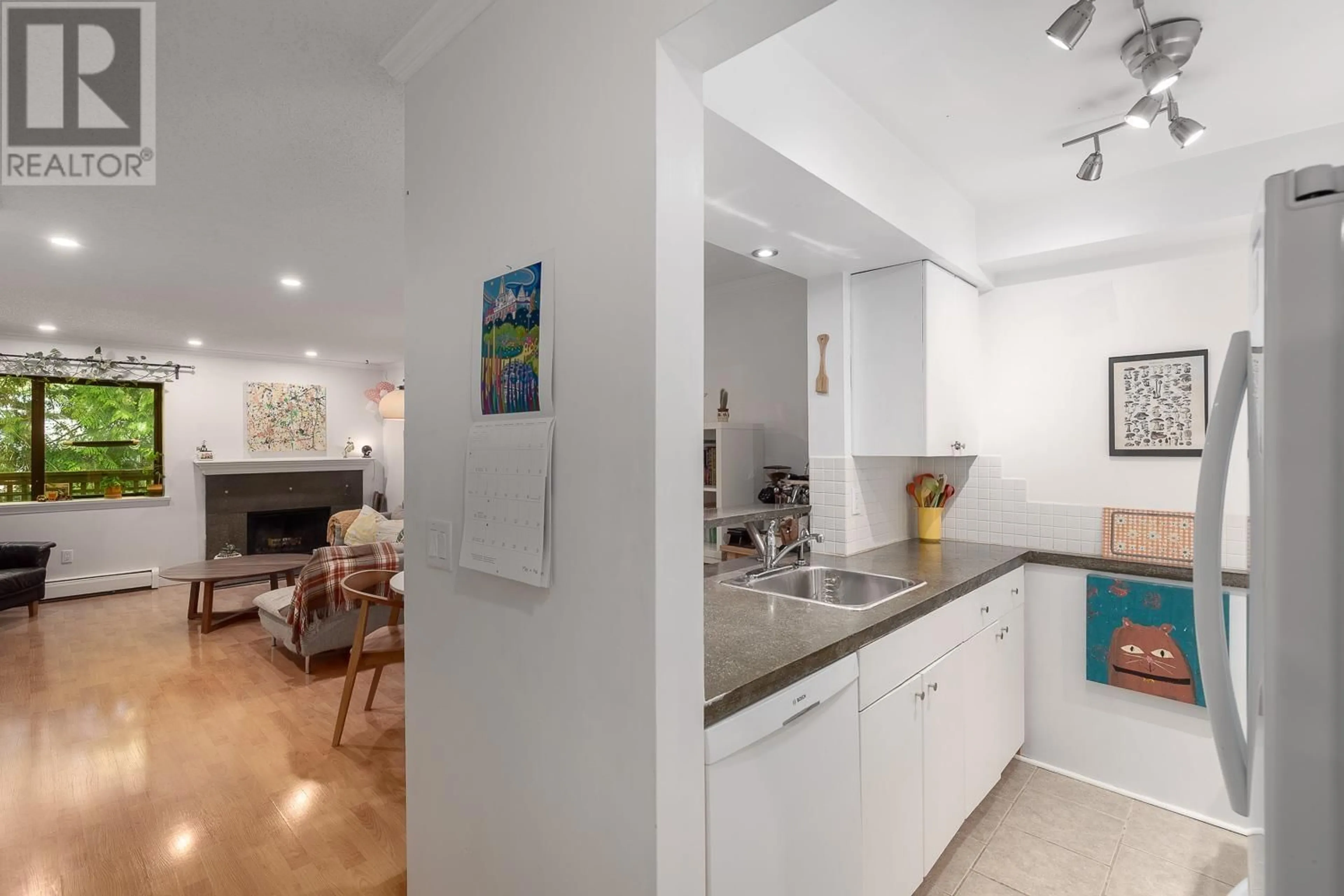 Open concept kitchen, ceramic/tile floor for 110 - 3275 MOUNTAIN HIGHWAY, North Vancouver British Columbia V7K2H4