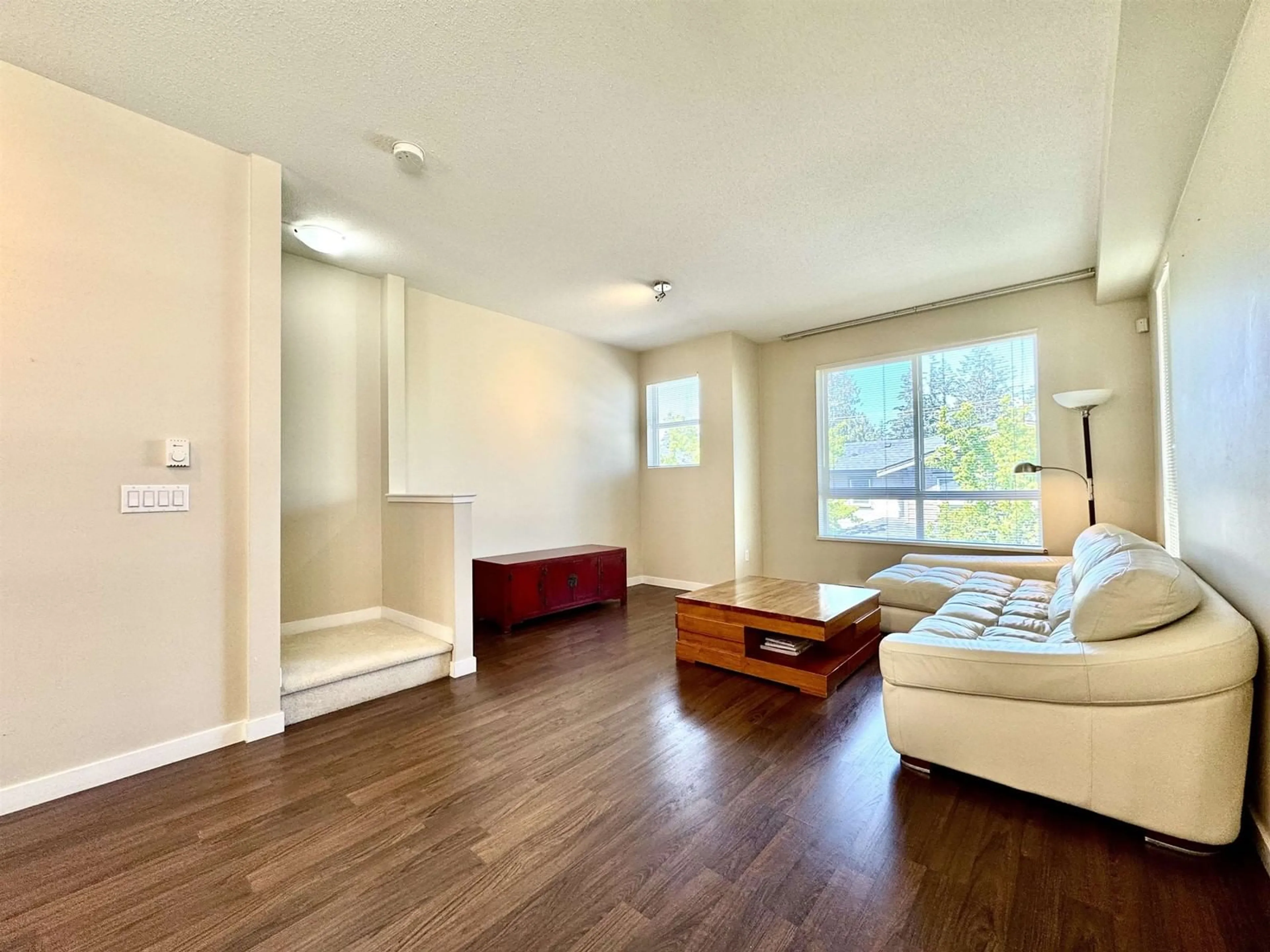 Living room with furniture, wood/laminate floor for 137 - 2729 158, Surrey British Columbia V3Z1P4