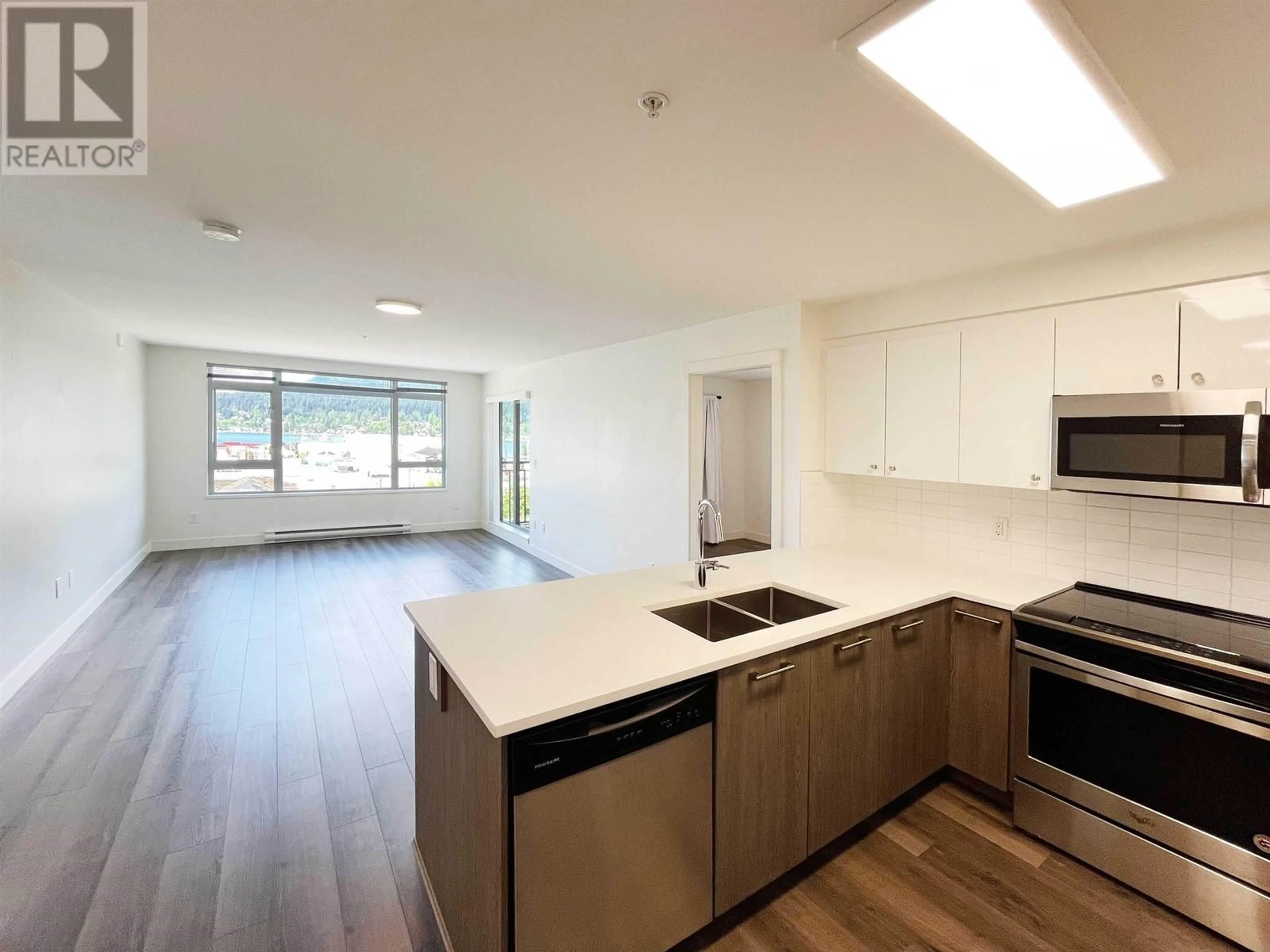 Open concept kitchen, unknown for 411 - 2525 CLARKE STREET, Port Moody British Columbia V3H0J3