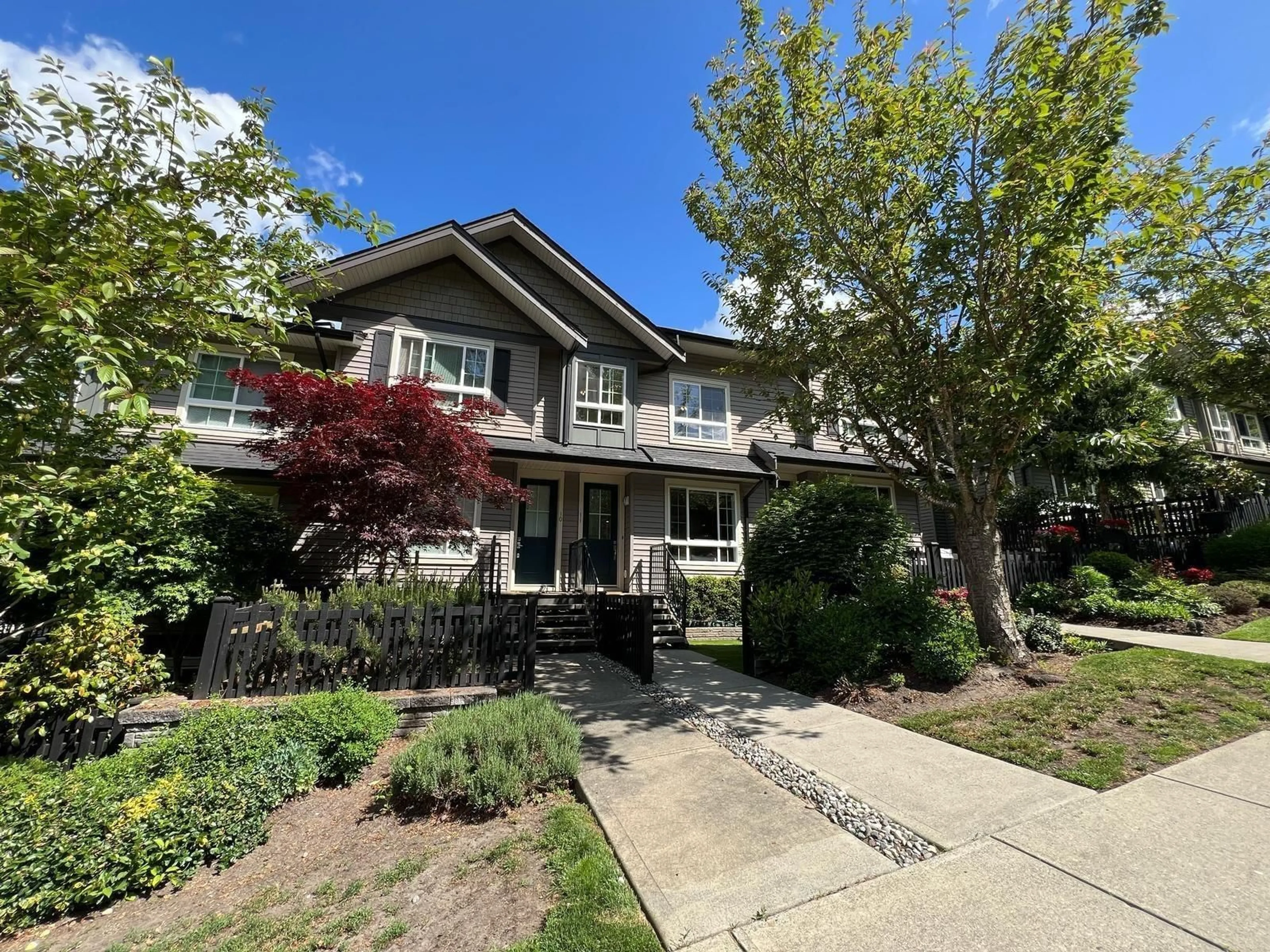 A pic from outside/outdoor area/front of a property/back of a property/a pic from drone, street for 11 - 21867 50, Langley British Columbia V3A3T2