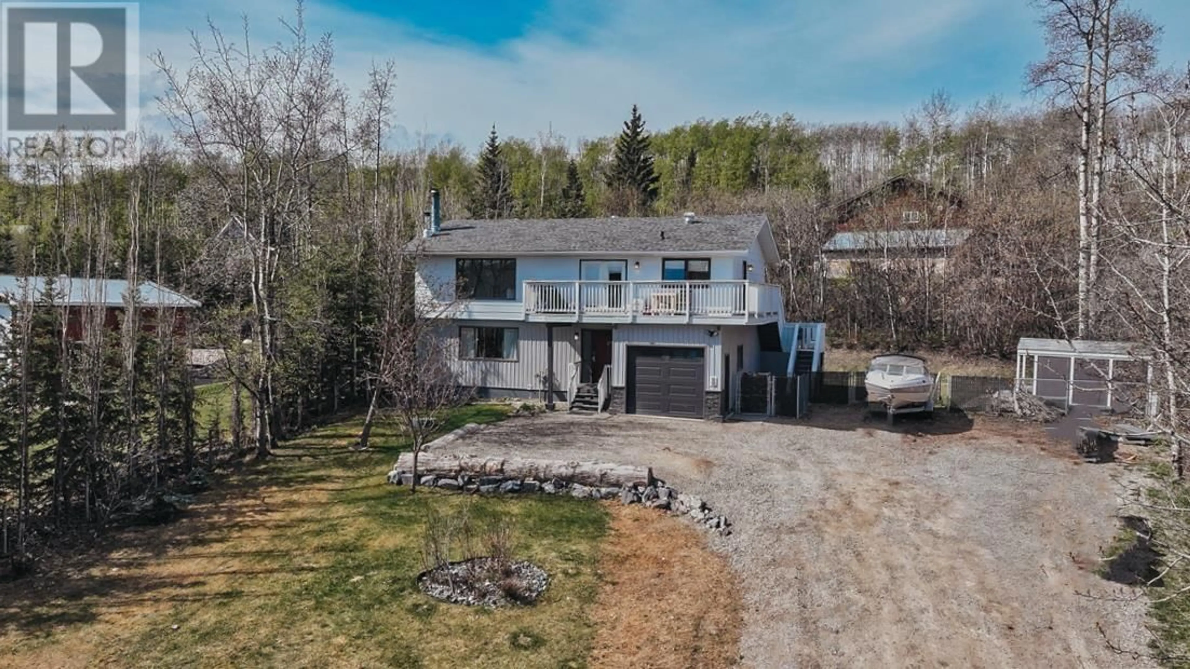 A pic from outside/outdoor area/front of a property/back of a property/a pic from drone, unknown for 13223 LAKESHORE DRIVE, Charlie Lake British Columbia V0C1H0