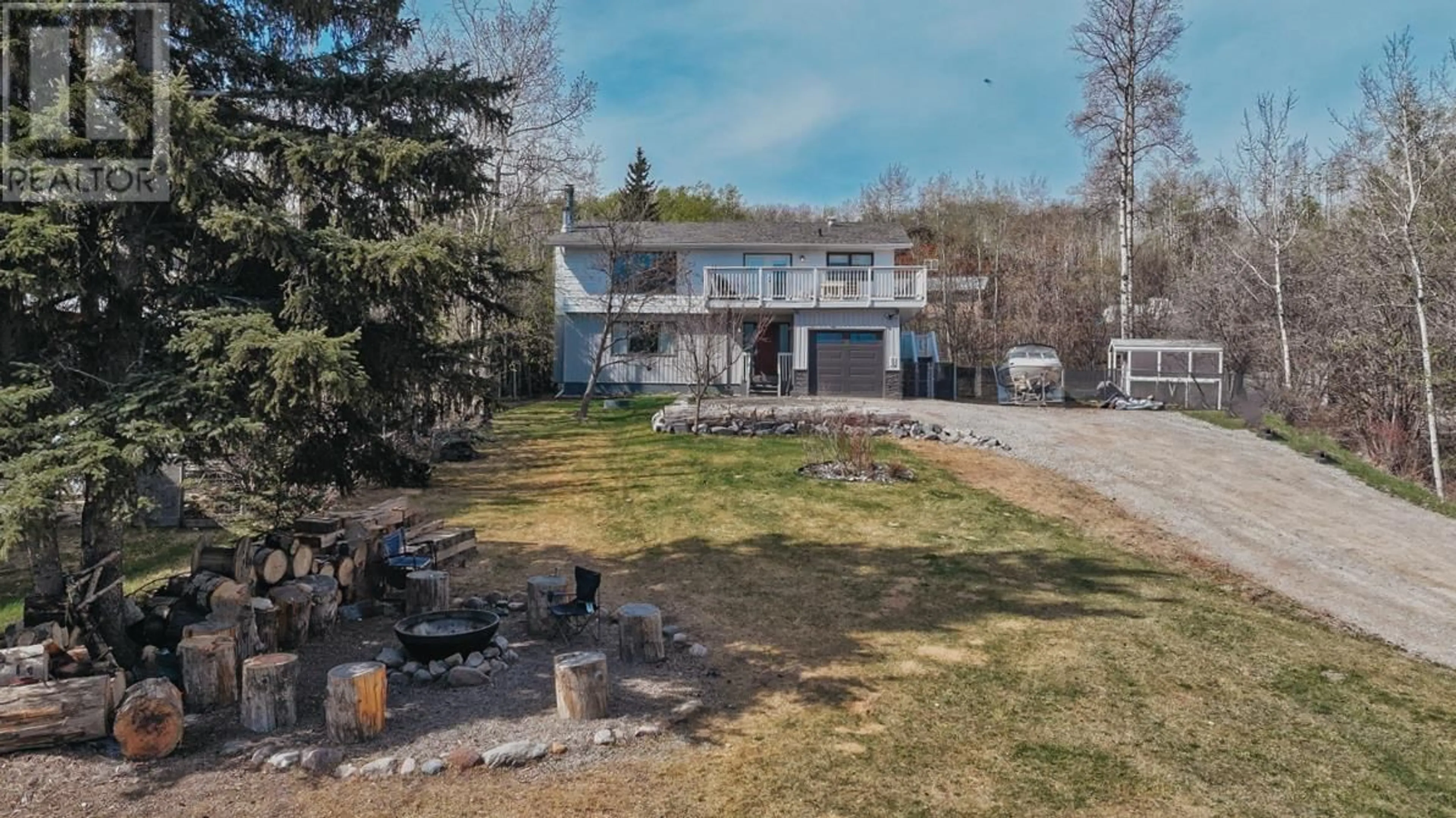 A pic from outside/outdoor area/front of a property/back of a property/a pic from drone, unknown for 13223 LAKESHORE DRIVE, Charlie Lake British Columbia V0C1H0