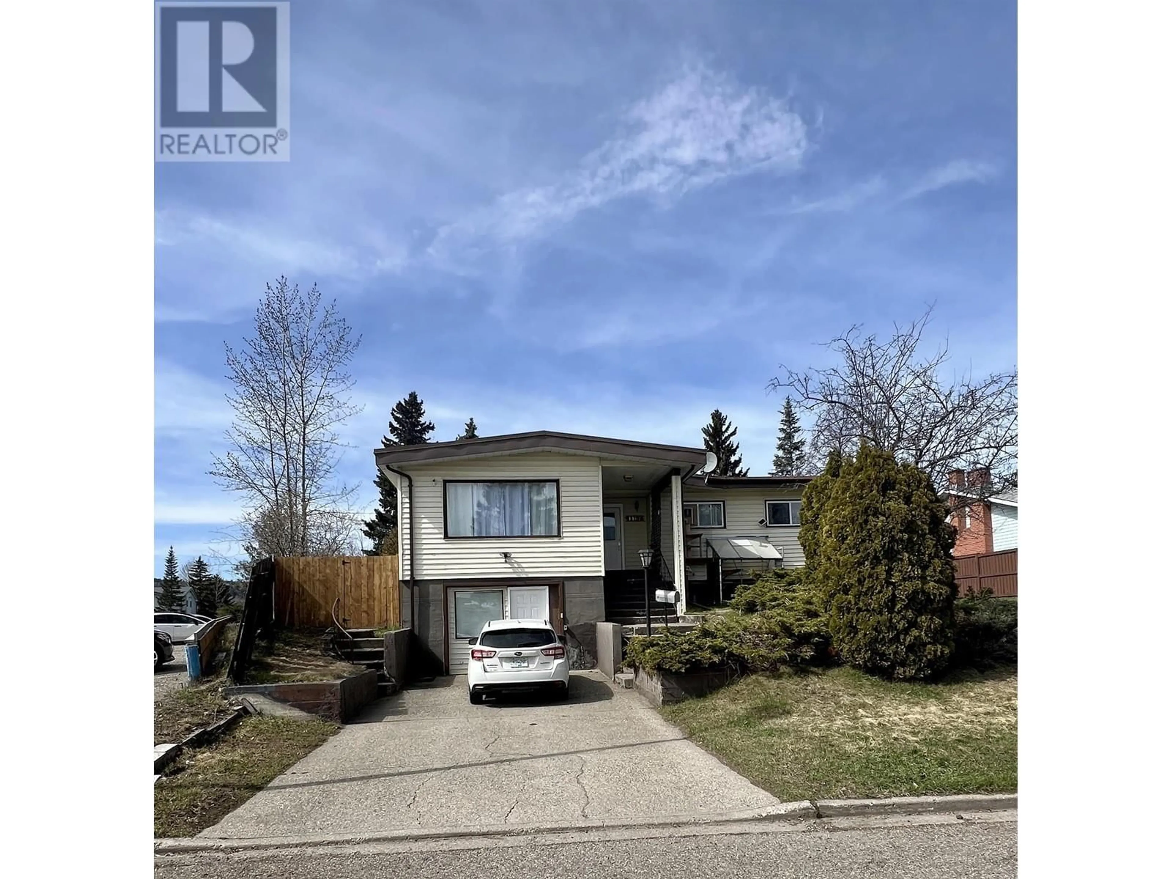A pic from outside/outdoor area/front of a property/back of a property/a pic from drone, street for 1467 FRASER CRESCENT, Prince George British Columbia V2M3Y4