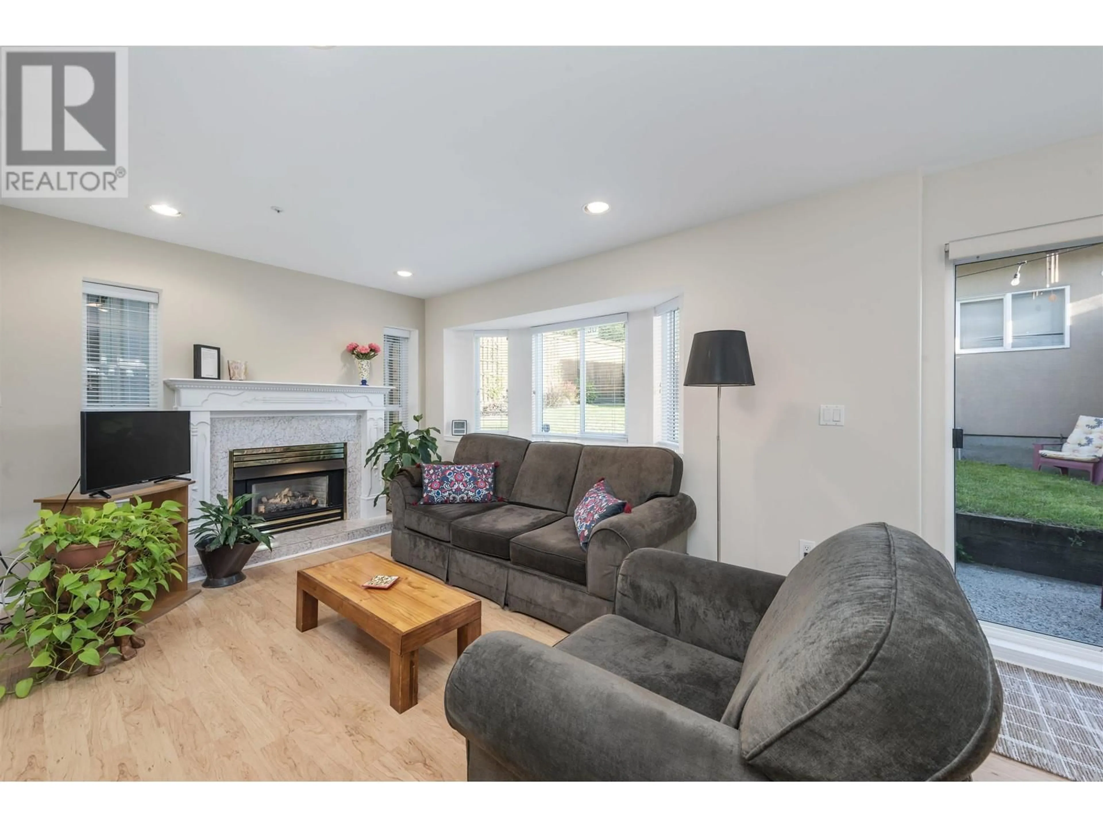 Living room with furniture, wood/laminate floor for 1801 LAKEWOOD DRIVE, Vancouver British Columbia V4N4T3