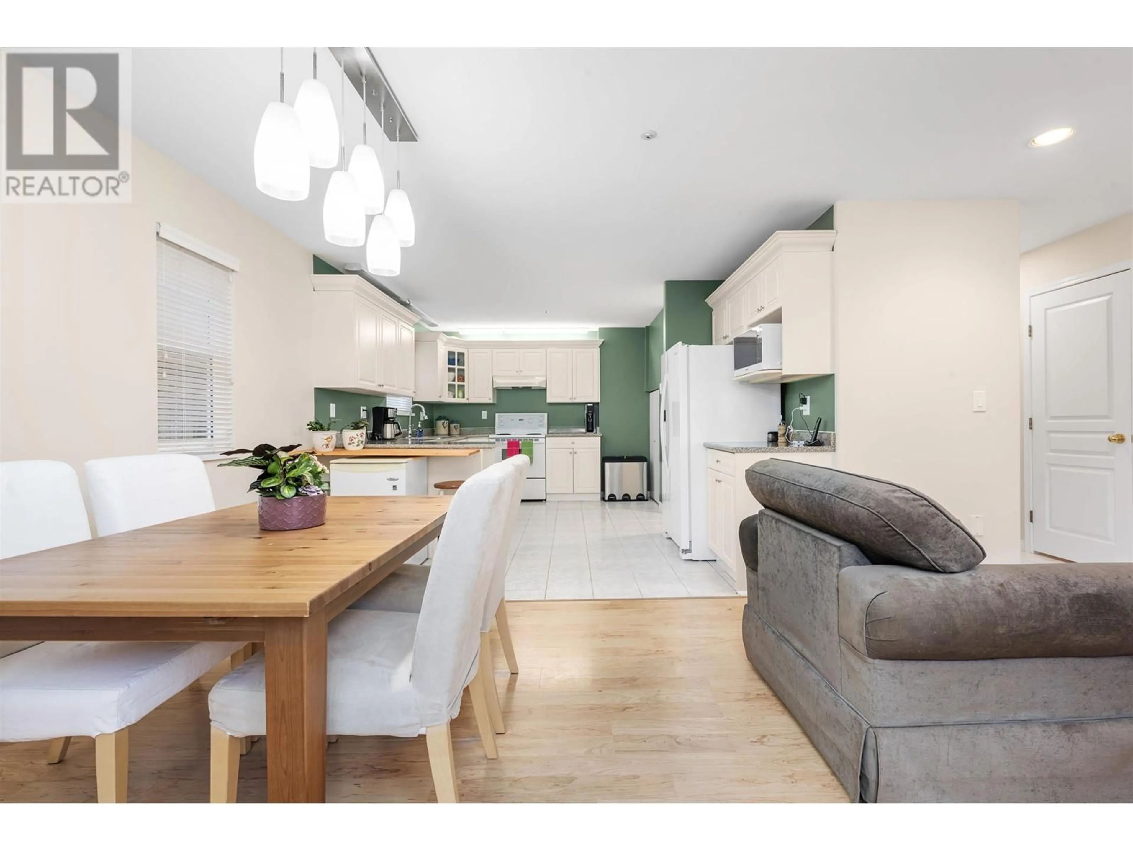 Open concept kitchen, wood/laminate floor for 1801 LAKEWOOD DRIVE, Vancouver British Columbia V4N4T3