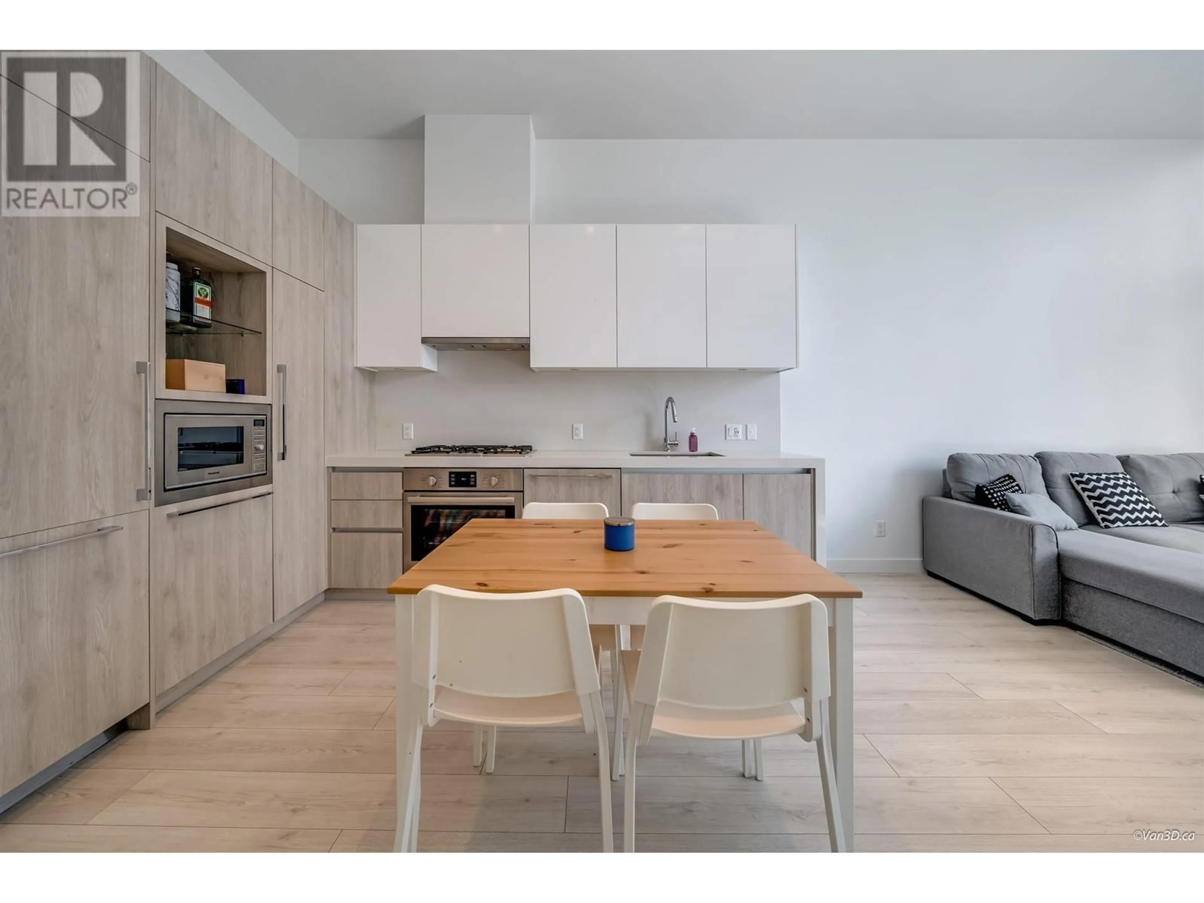 Open concept kitchen, wood/laminate floor for 309 - 6080 MCKAY AVENUE, Burnaby British Columbia V5H0J4