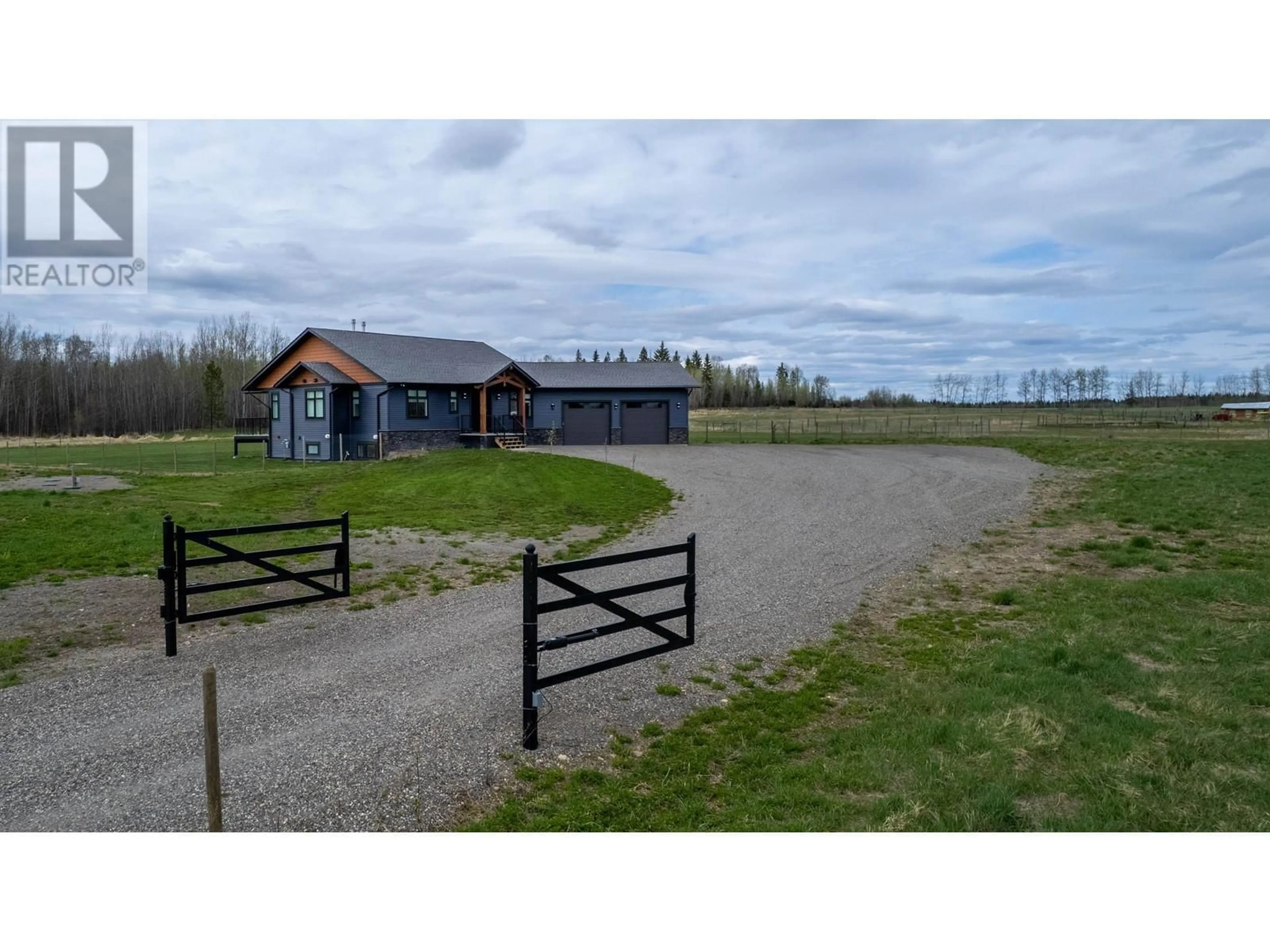 A pic from outside/outdoor area/front of a property/back of a property/a pic from drone, unknown for 7400 TABORVIEW DRIVE, Prince George British Columbia V2N5W4