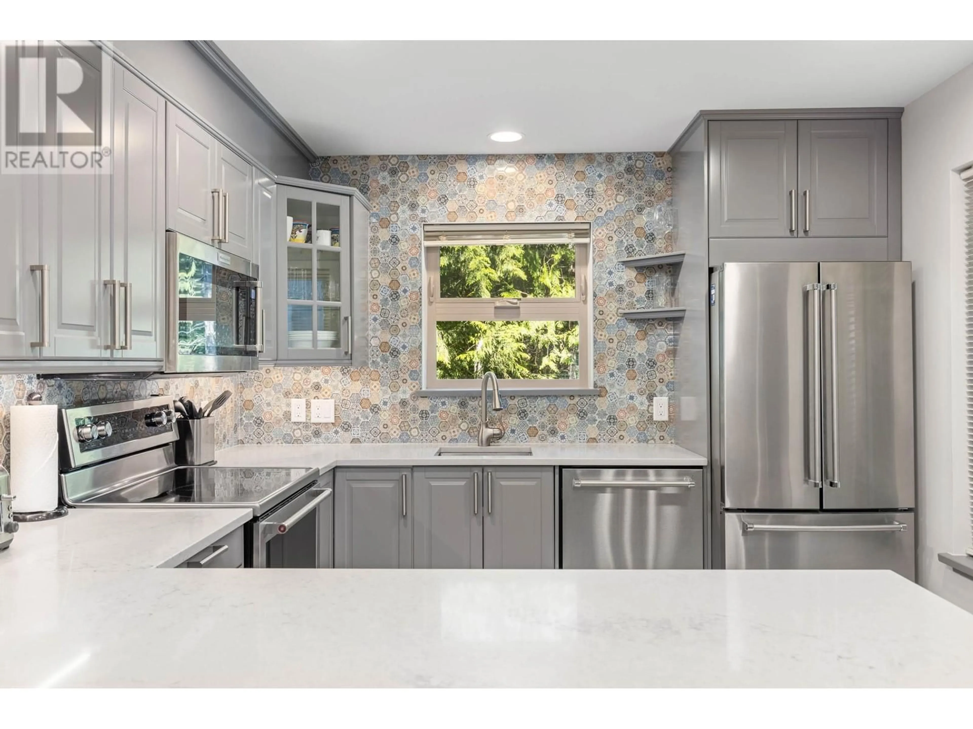 Contemporary kitchen, ceramic/tile floor for 101 - 3050 HILLCREST DRIVE, Whistler British Columbia V8E0T8