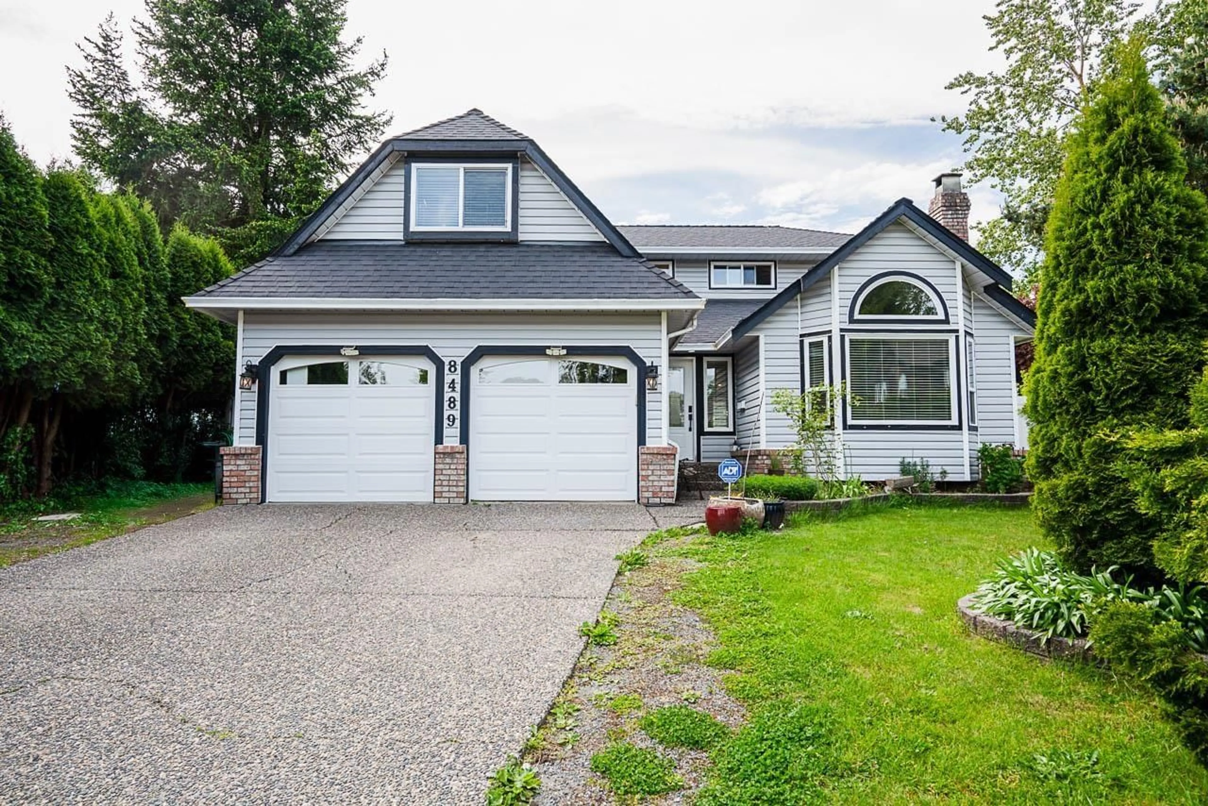 Home with vinyl exterior material, street for 8489 146, Surrey British Columbia V3S7R4
