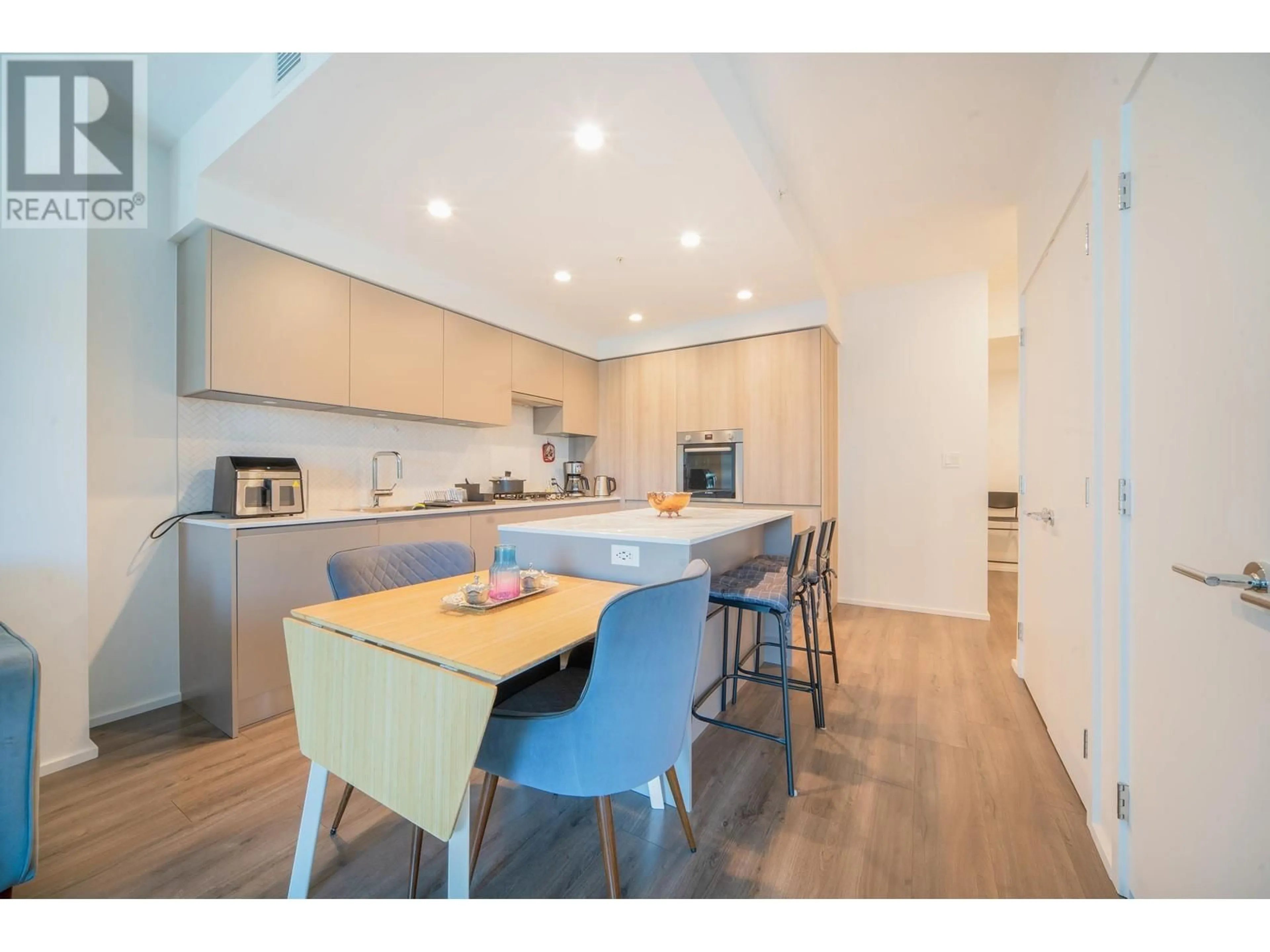 Open concept kitchen, wood/laminate floor for 3311 - 3833 EVERGREEN PLACE, Burnaby British Columbia V3J0M2