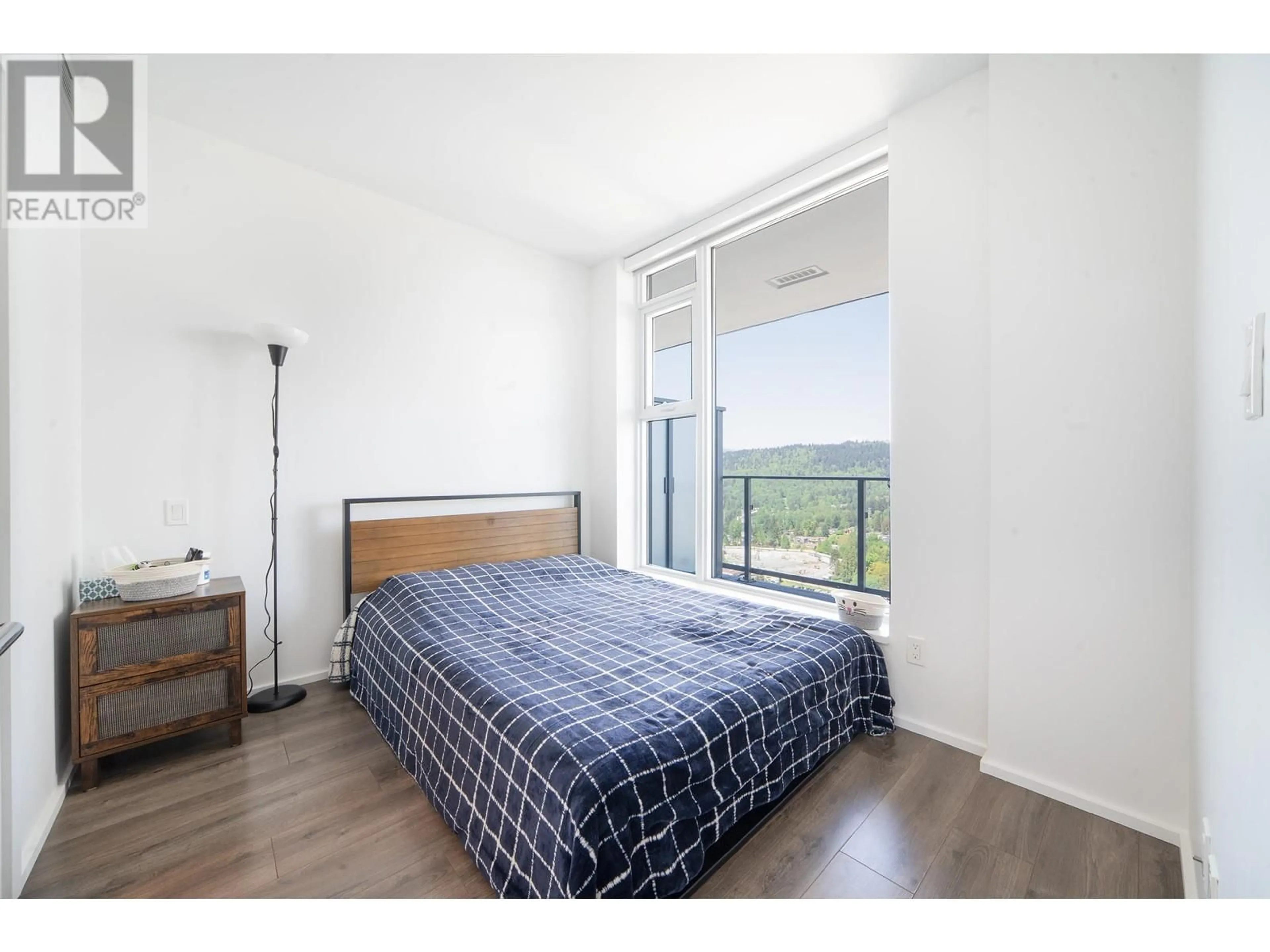 Bedroom with bed, wood/laminate floor for 3311 - 3833 EVERGREEN PLACE, Burnaby British Columbia V3J0M2