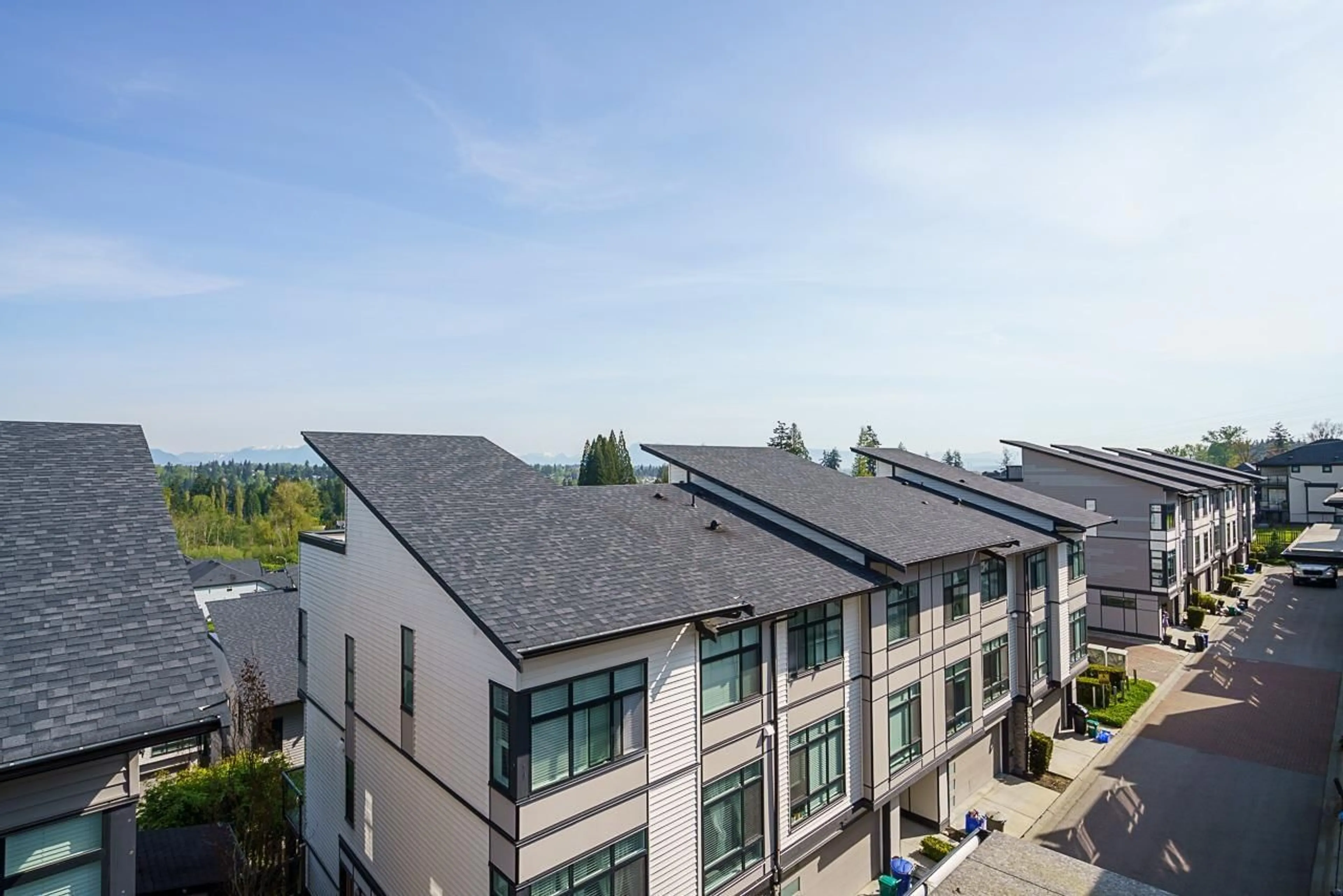 A pic from outside/outdoor area/front of a property/back of a property/a pic from drone, city buildings view from balcony for 12 - 14057 60A, Surrey British Columbia V3X0J2
