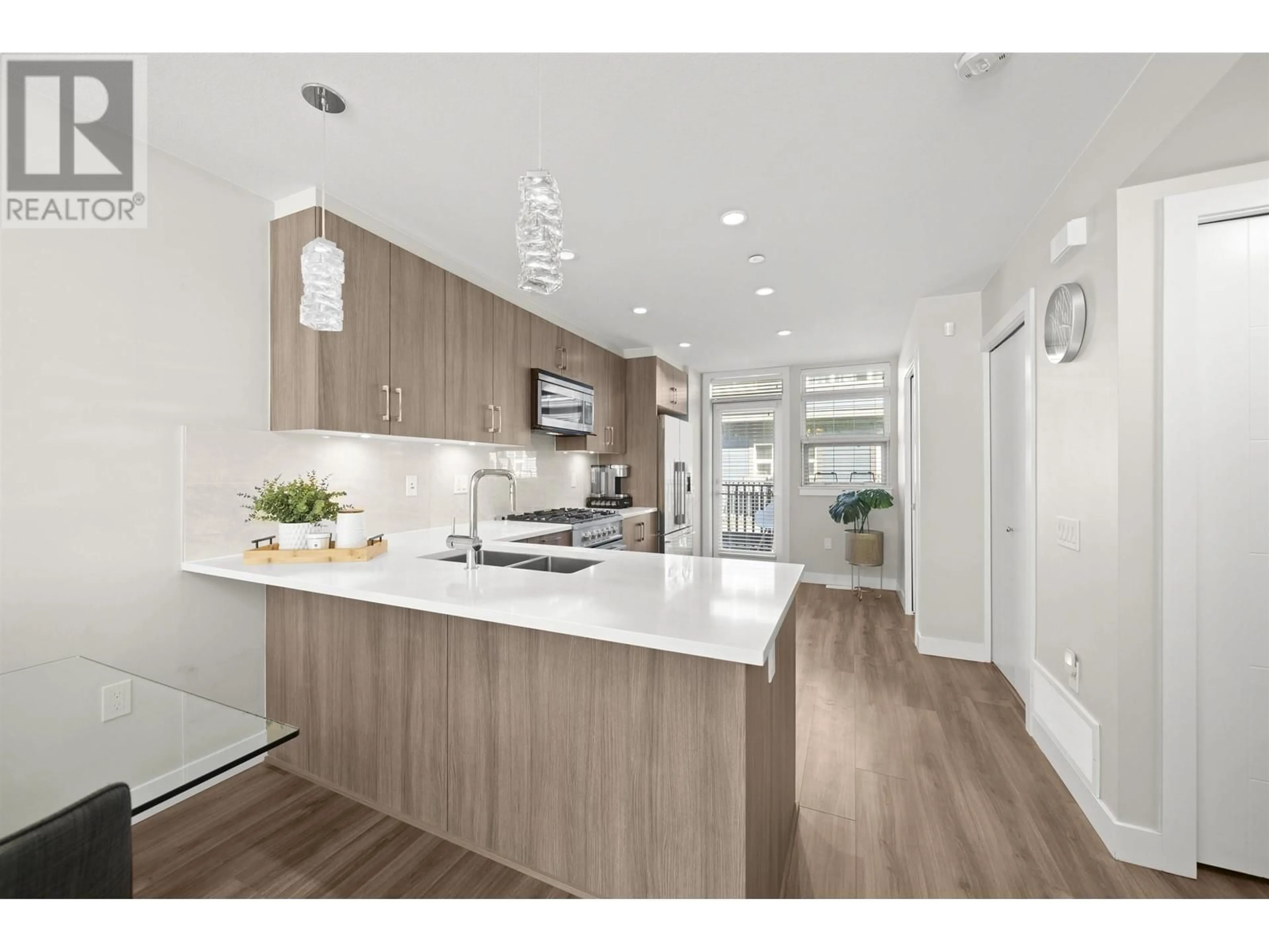 Open concept kitchen, wood/laminate floor for 97 - 4991 NO. 5 ROAD, Richmond British Columbia V6X0S9