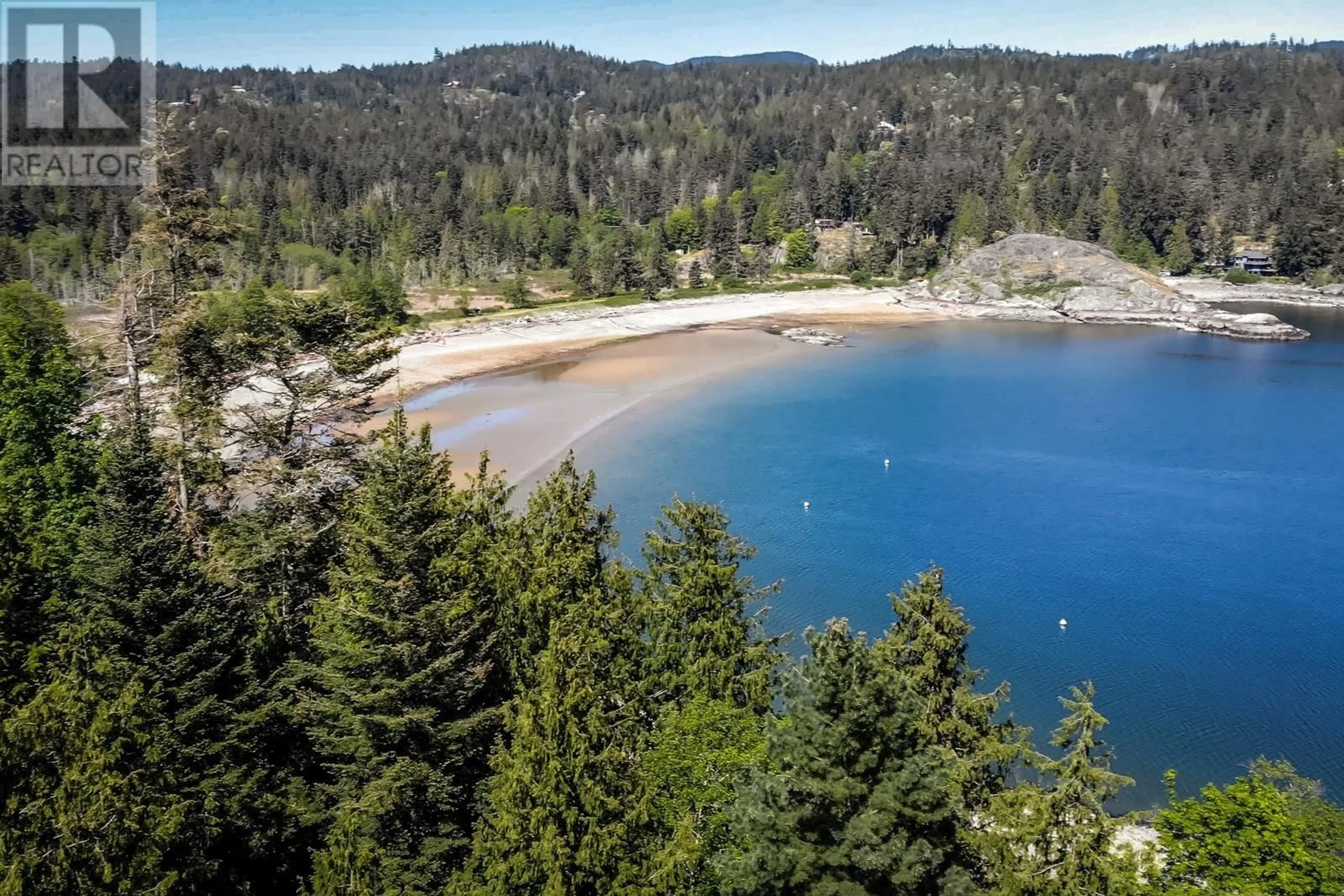 A pic from outside/outdoor area/front of a property/back of a property/a pic from drone, water/lake/river/ocean view for 7711 REDROOFFS ROAD, Halfmoon Bay British Columbia V7Z1C4