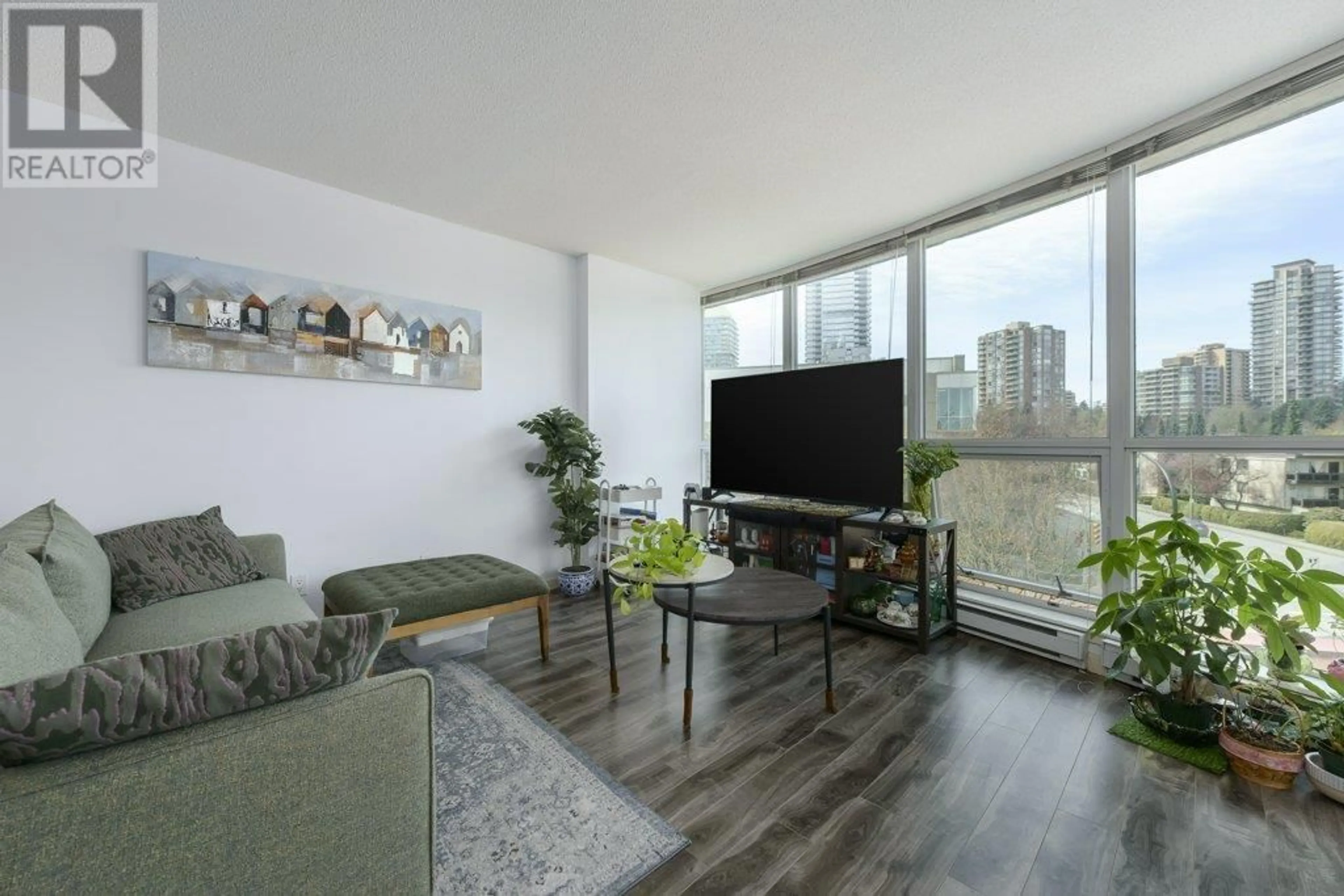 Living room with furniture, wood/laminate floor for 303 - 6088 WILLINGDON AVENUE, Burnaby British Columbia V5H4V2