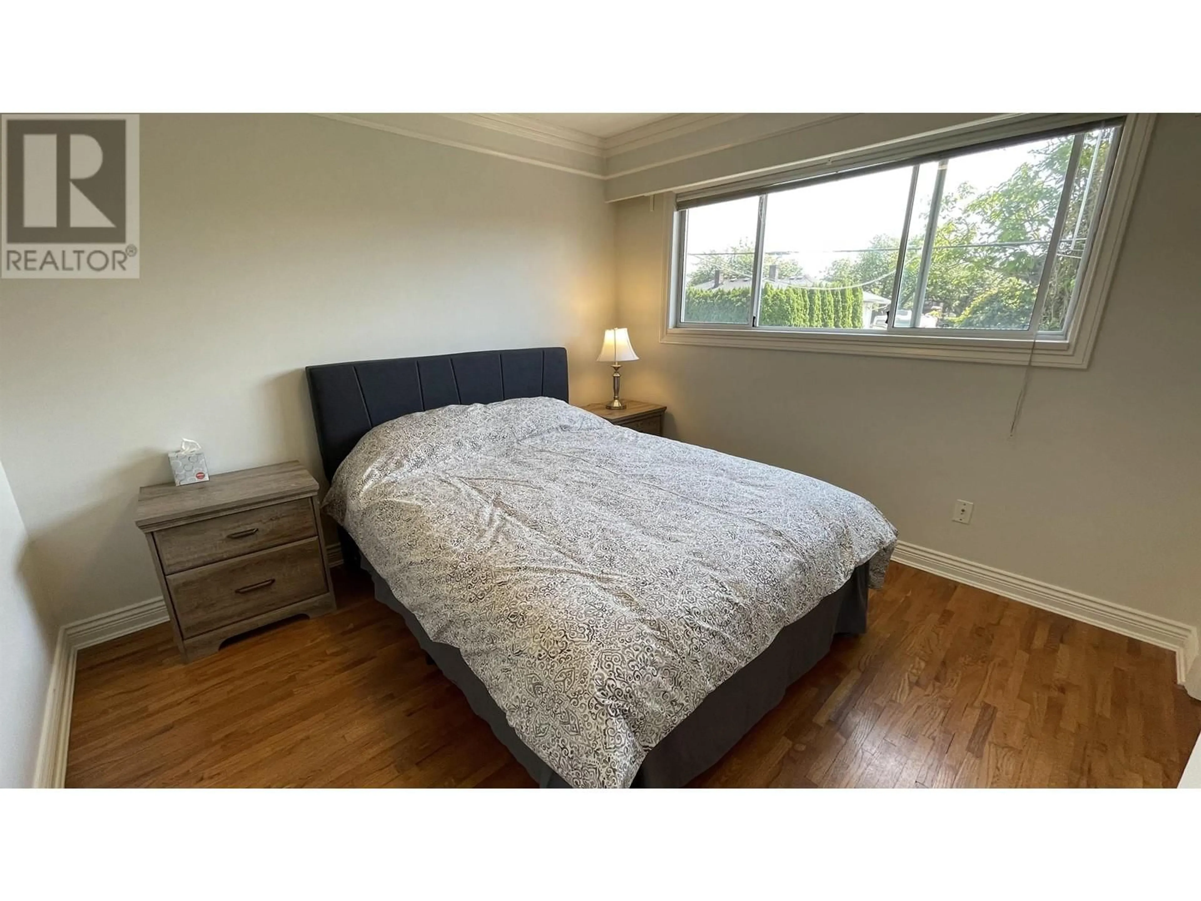 Bedroom with bed, wood/laminate floor for 816 52ND AVENUE, Vancouver British Columbia V5X1H2