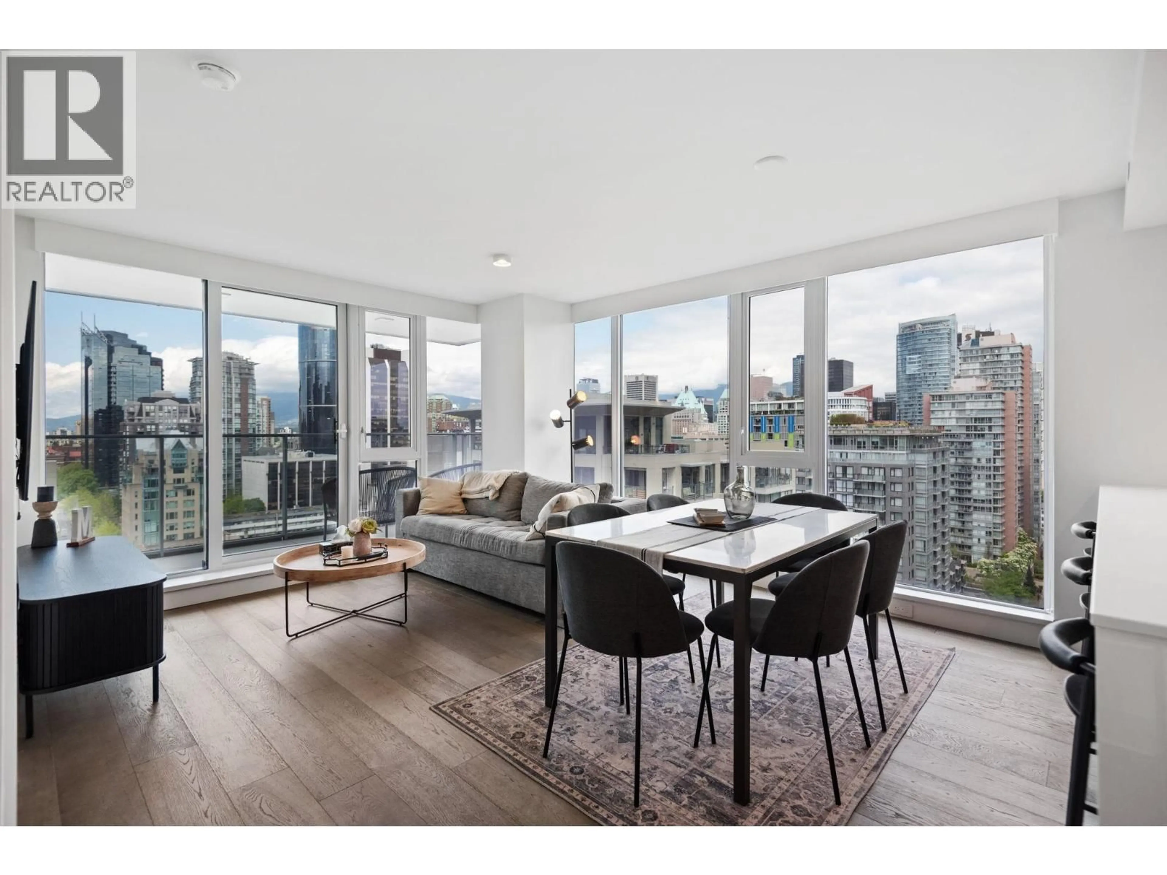 Living room with furniture, wood/laminate floor for 2002 - 1111 RICHARDS STREET, Vancouver British Columbia V6B0S3
